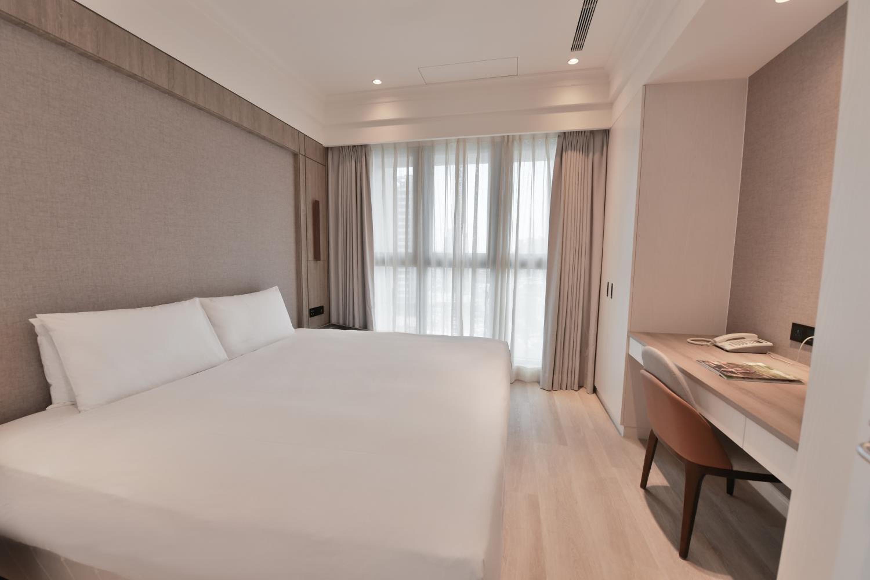 Deluxe Triple Suite
