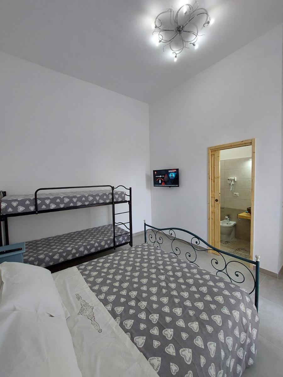 Quadruple Room with Private Bathroom