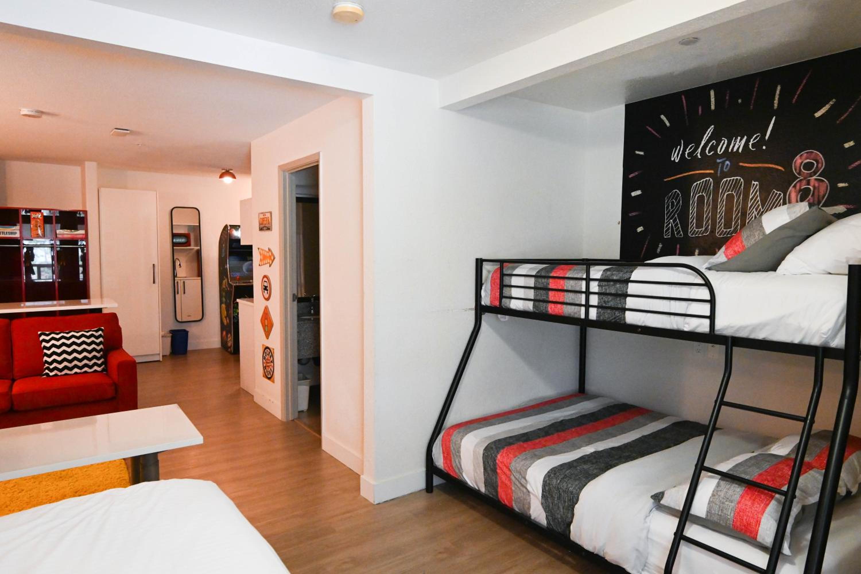 1 King Bed, 1 Twin and 1 Double Bunk Bed, Room 8 Concept Family Ste, Non-Smoking - Photo 1