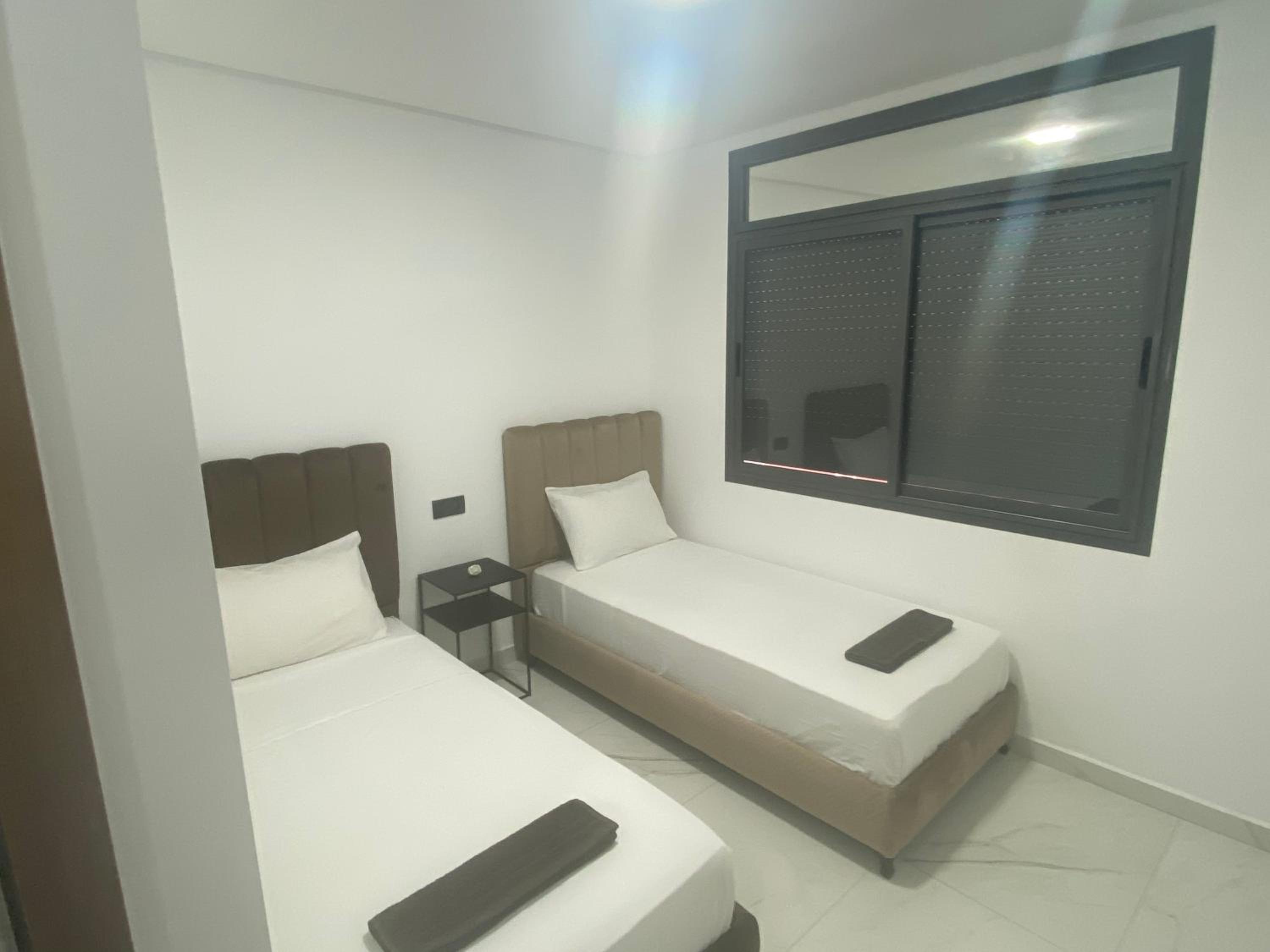 Three-Bedroom Apartment - Photo 8
