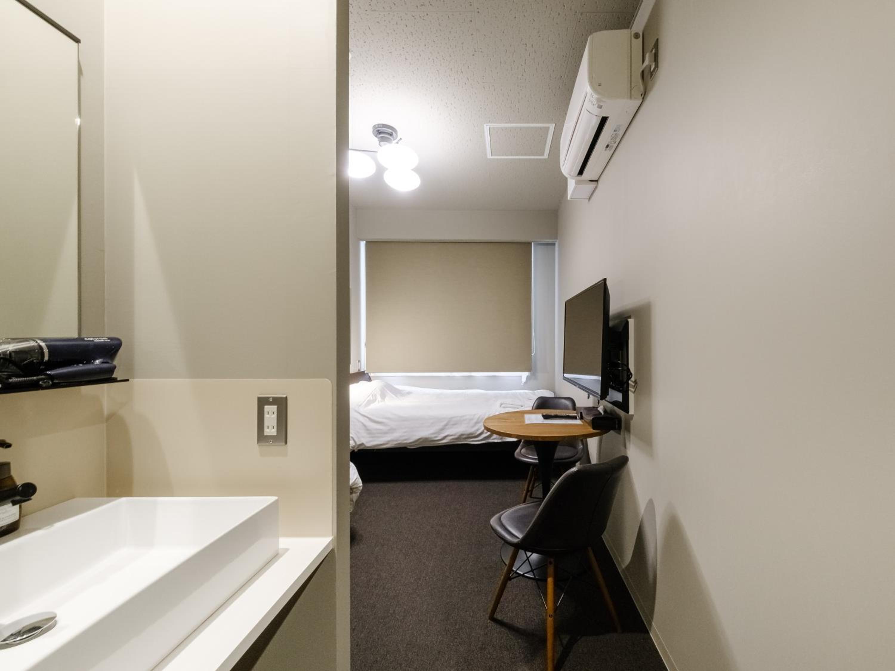 Standard Twin Room - Photo 8