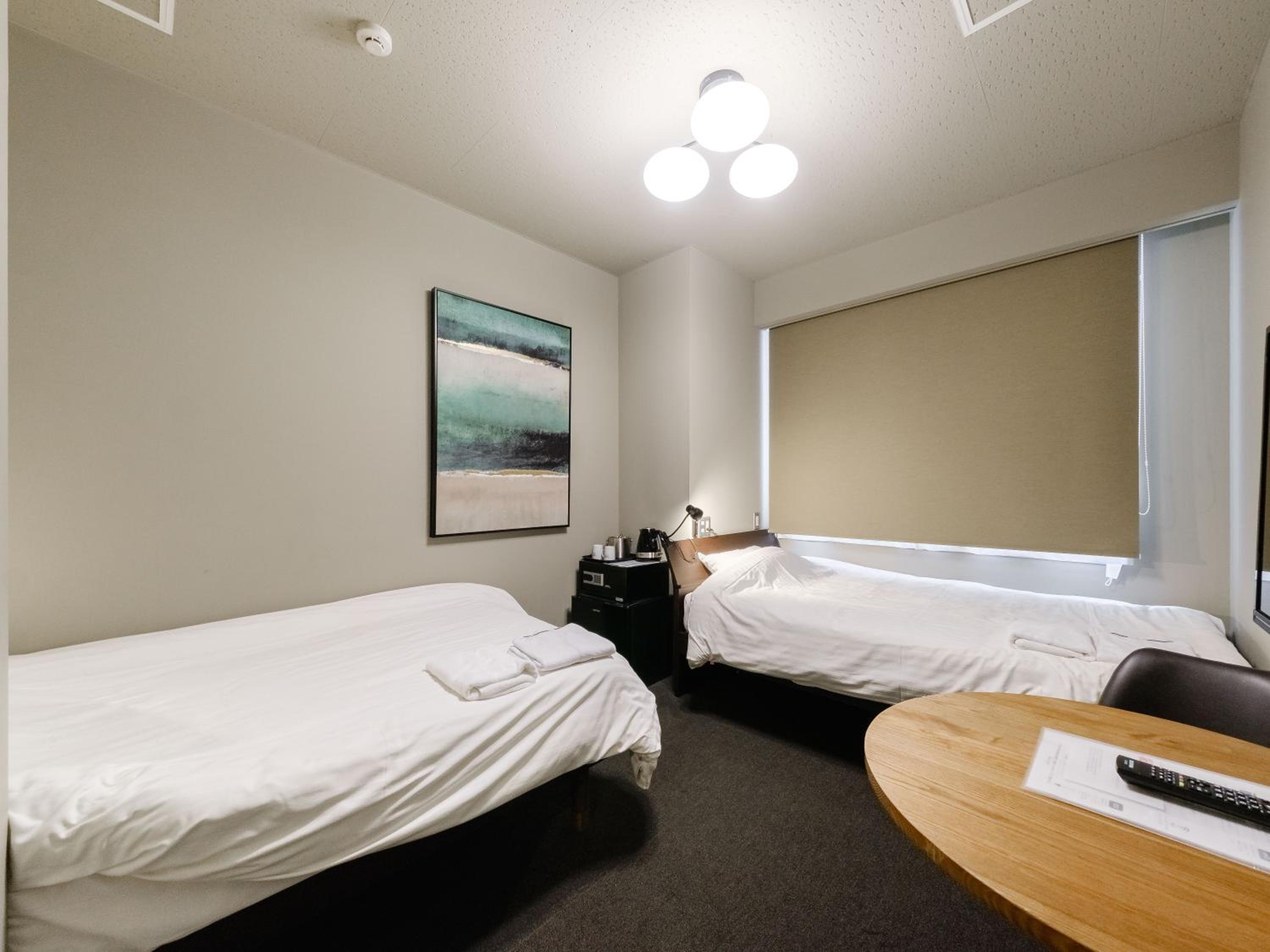 Standard Twin Room - Photo 9