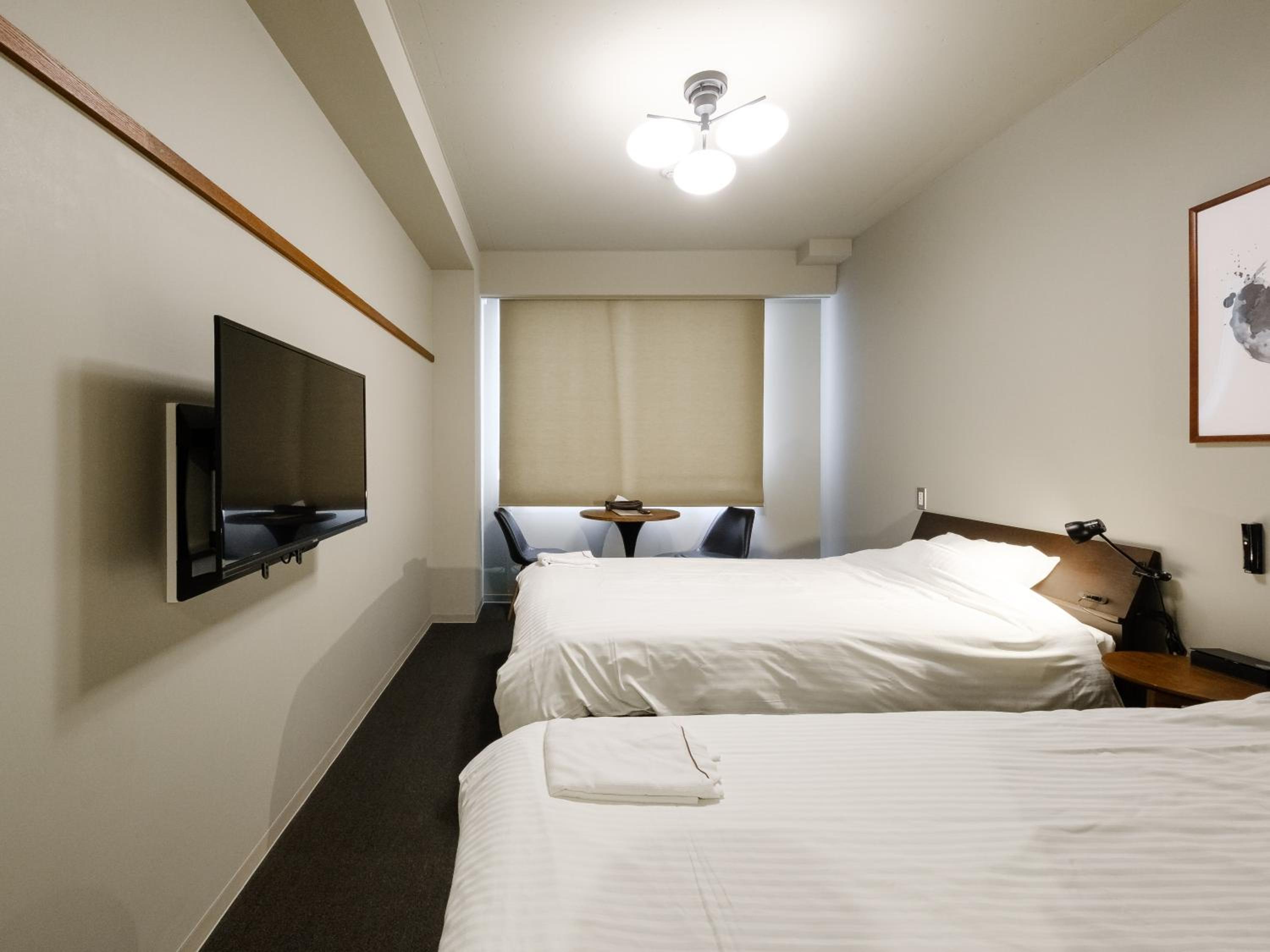 Moderate Twin Room A - Photo 2