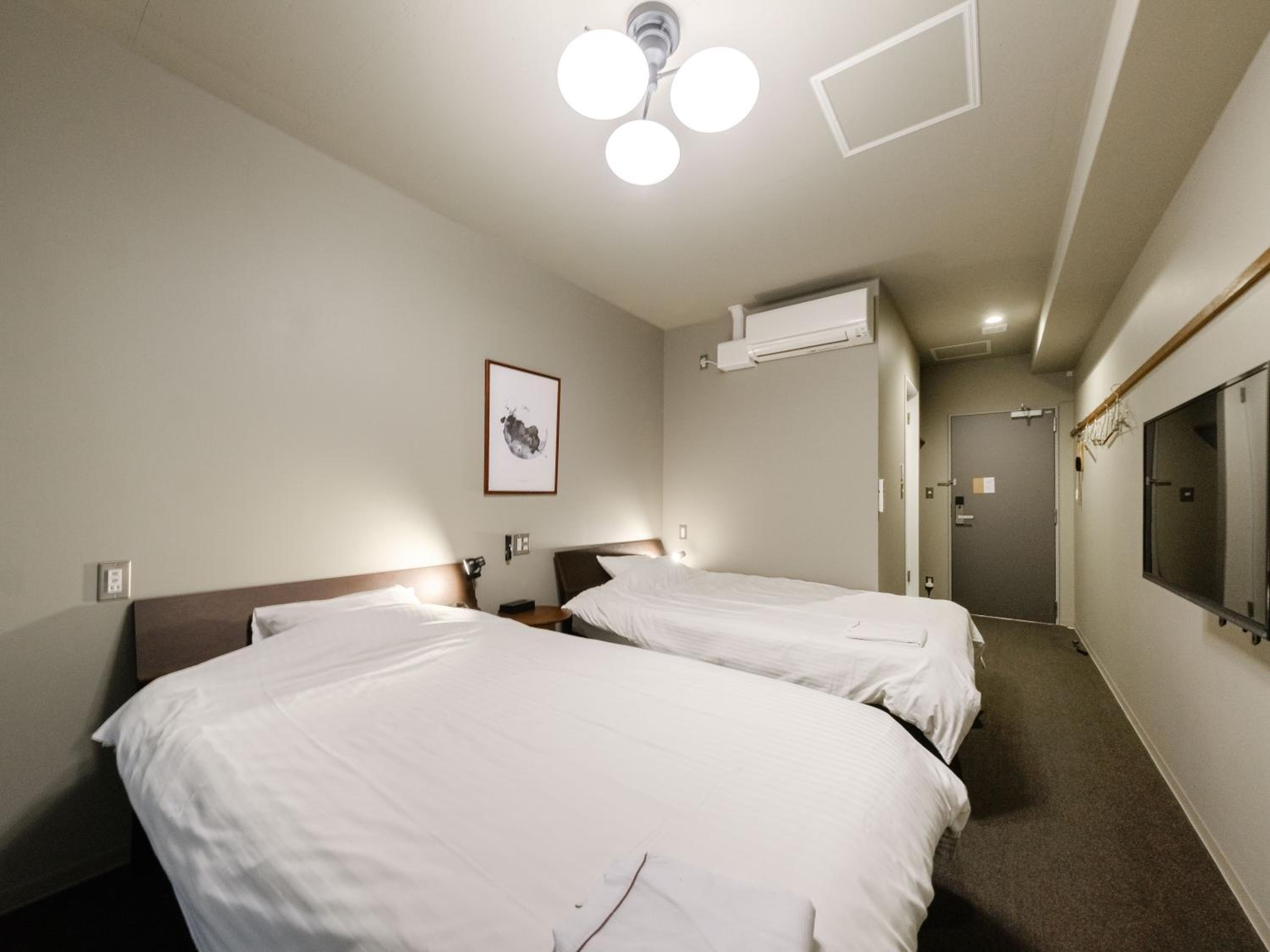 Moderate Twin Room A - Photo 7