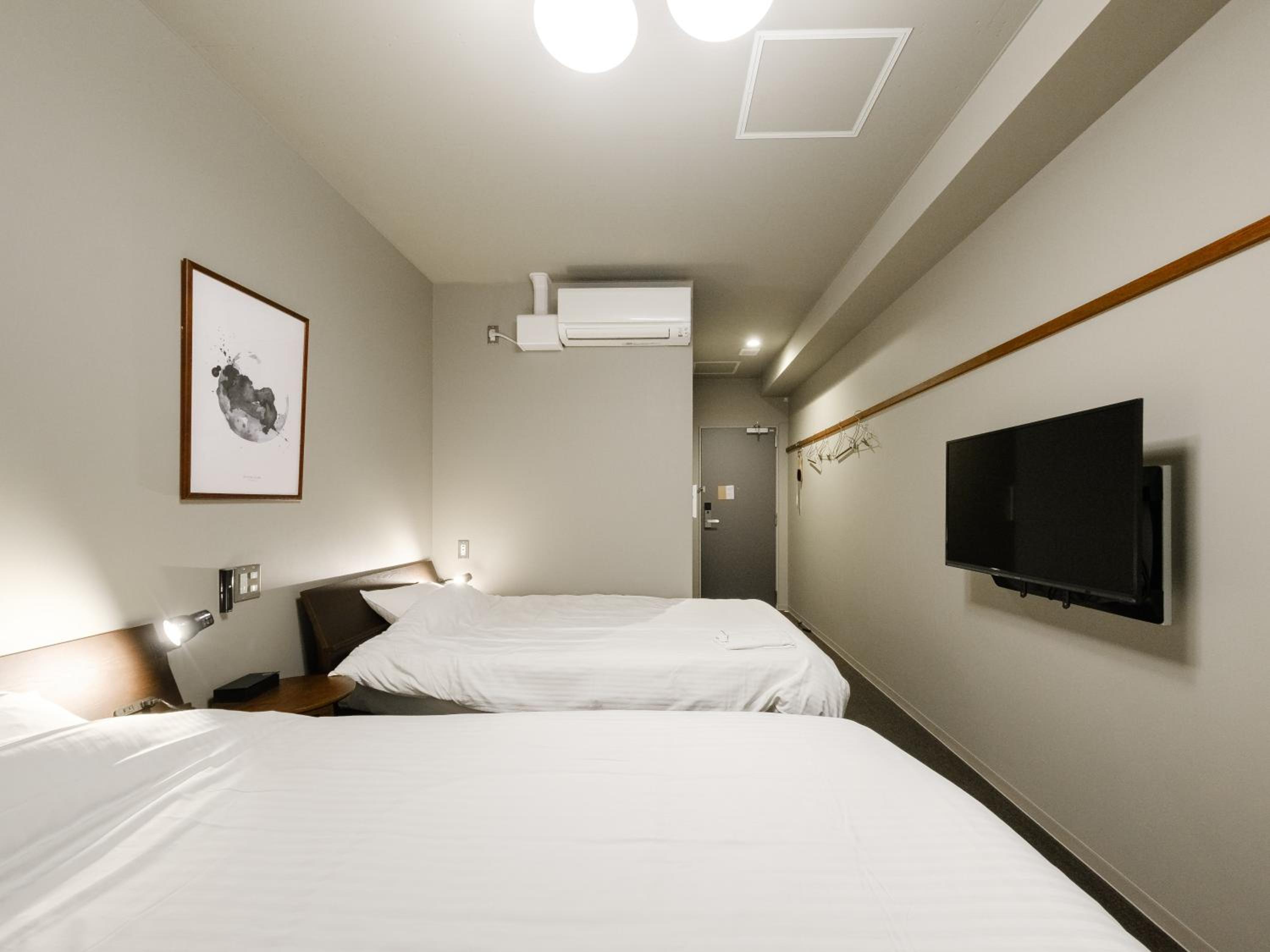Moderate Twin Room A - Photo 6