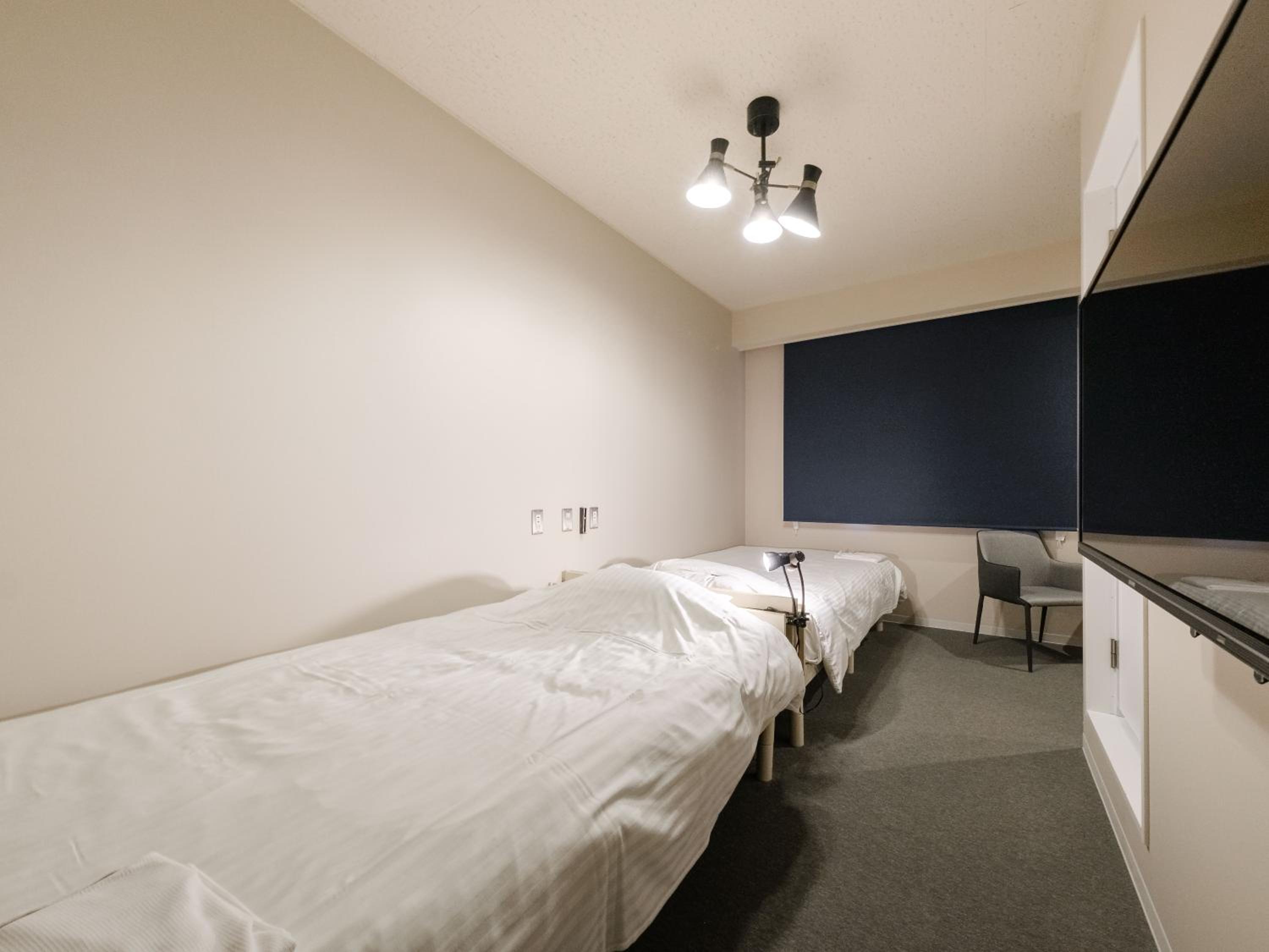 Moderate Twin Room B - Photo 5