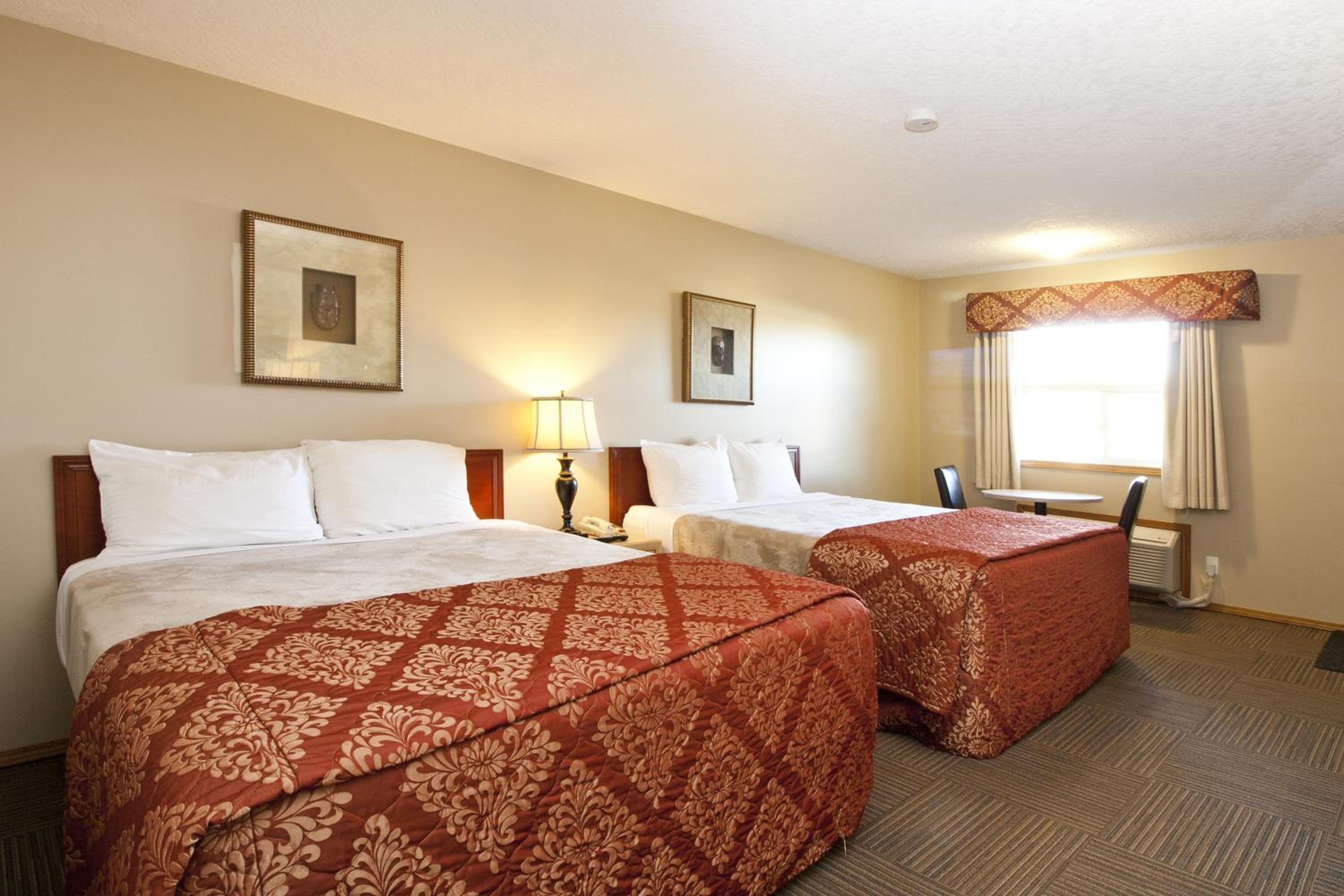 Standard Queen Room with Two Queen Beds photo 1
