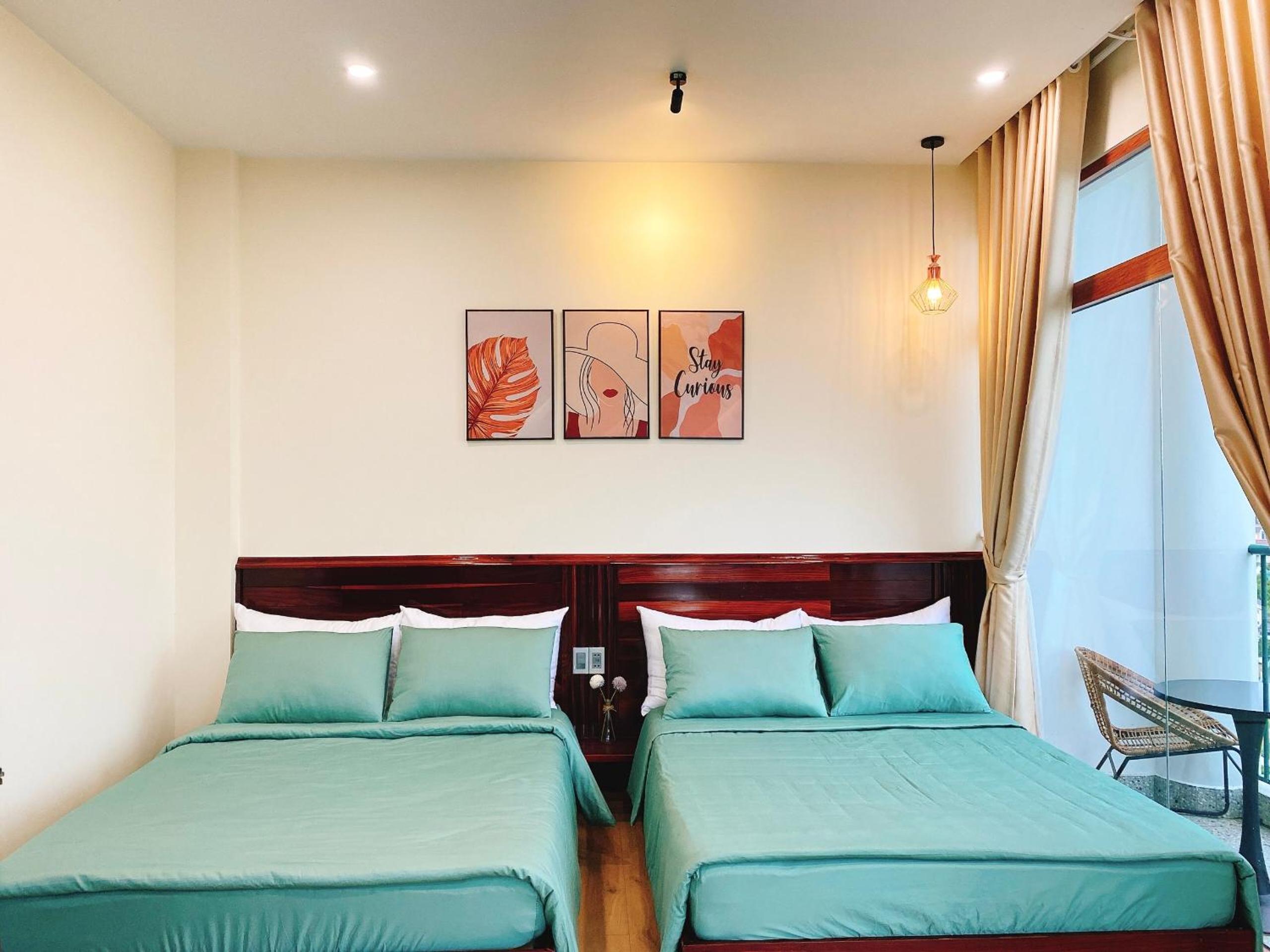 Quadruple Room with Balcony photo 2