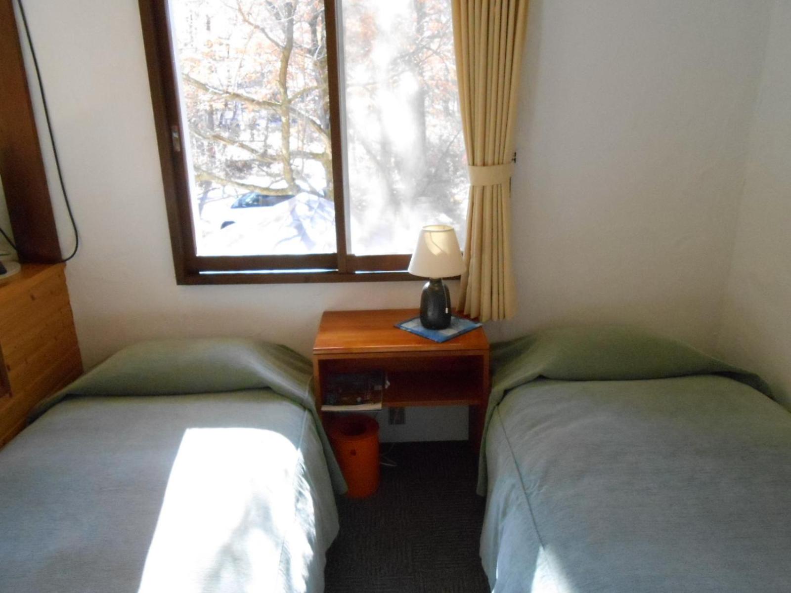 Twin Room With Shared Bathroom