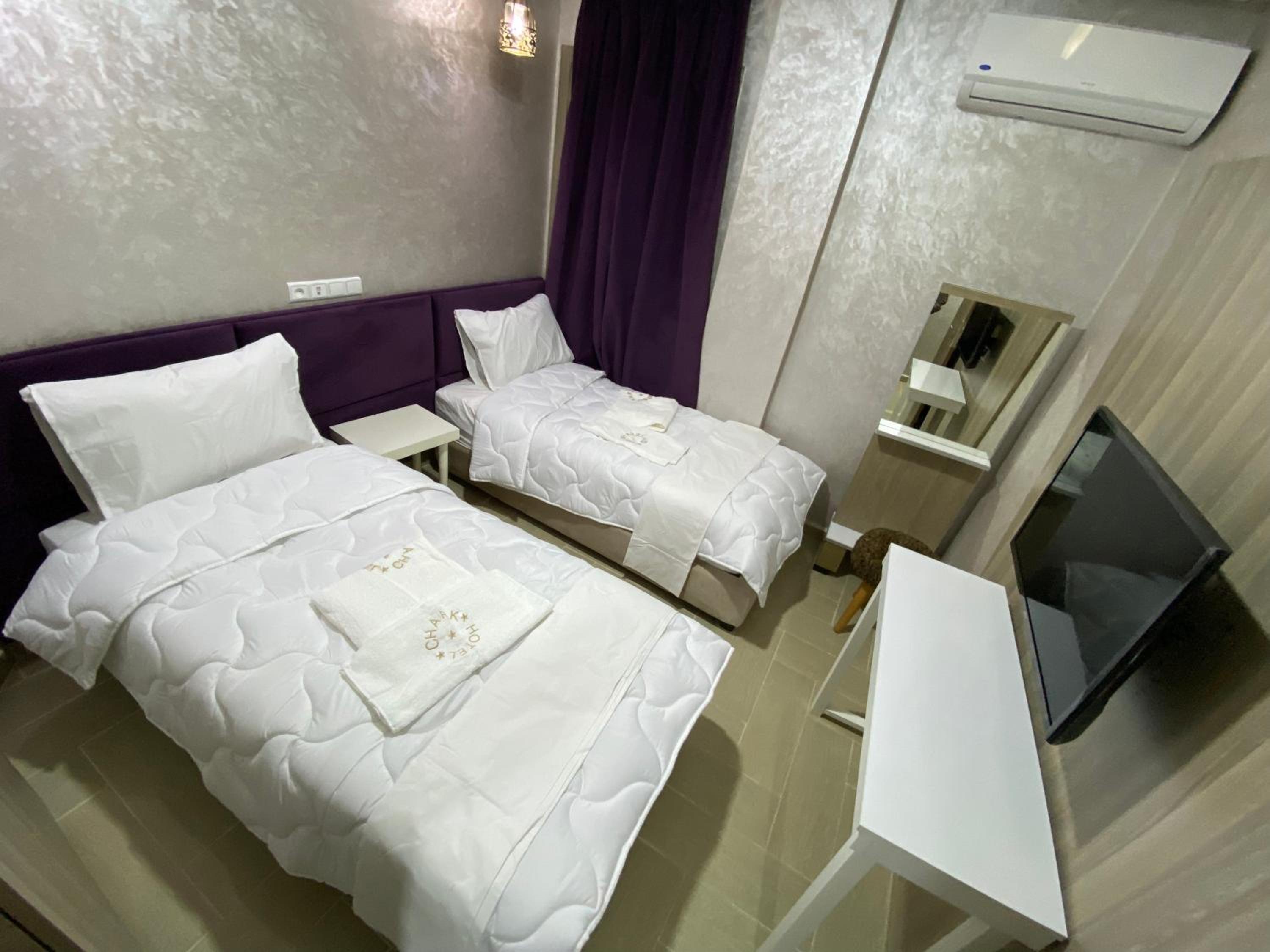 Deluxe Room (2 Adults + 1 Child) - Photo 7