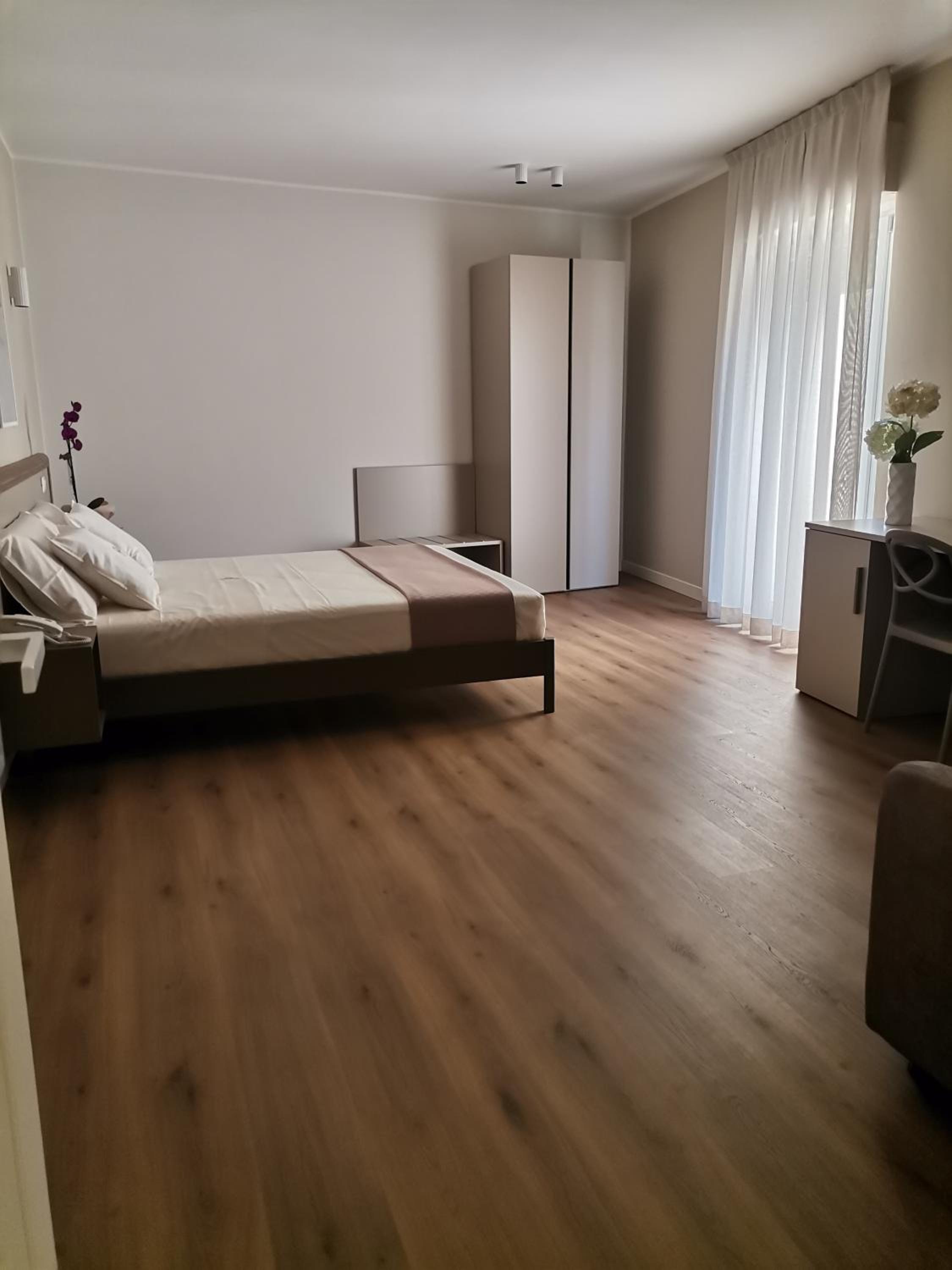 Quadruple Room with Bathroom - Photo 1