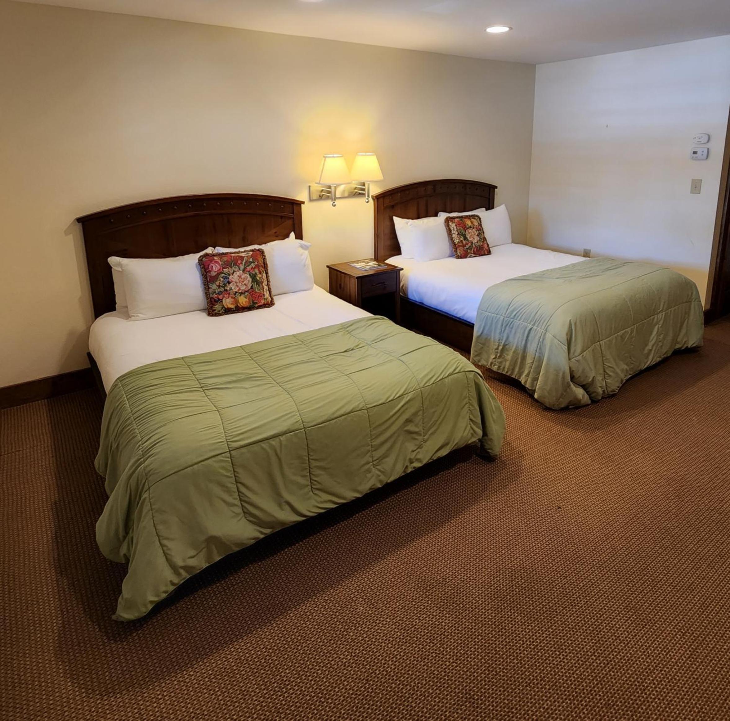 Deluxe Queen Room With Two Queen Beds photo 2
