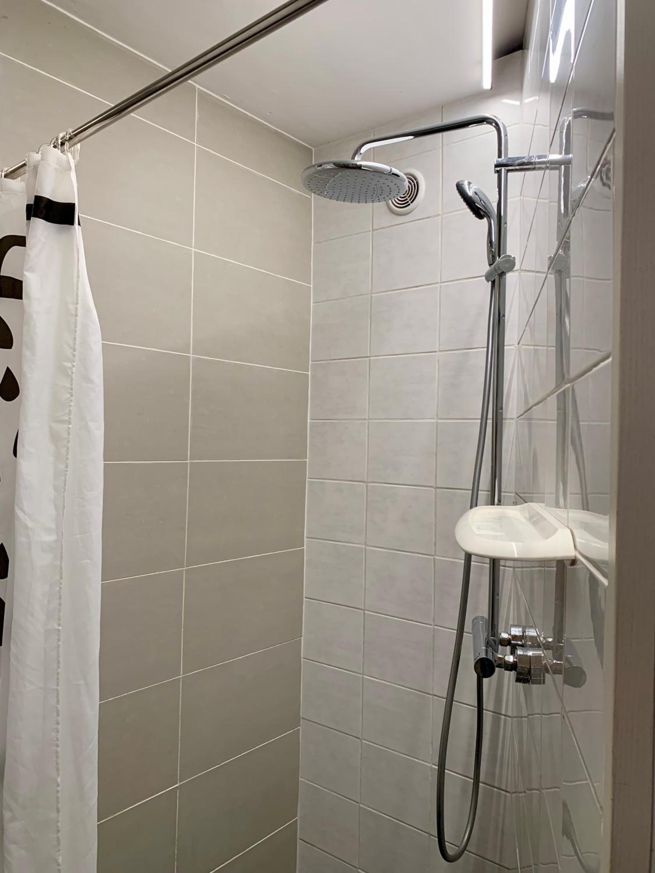 Apartment with Shower - Photo 16