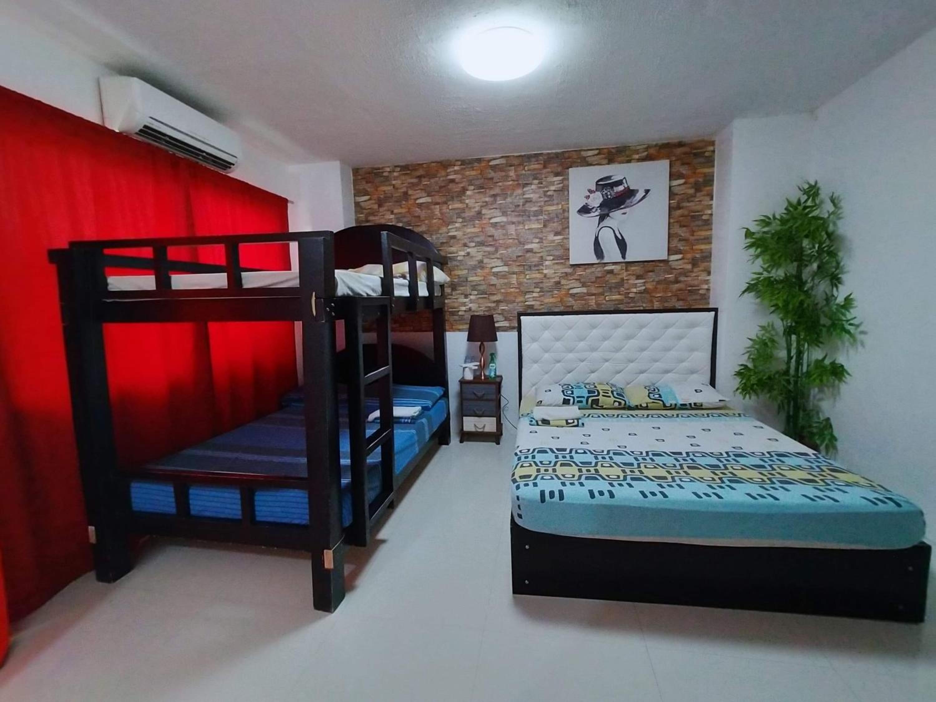Quadruple Room with Bathroom - Photo 1
