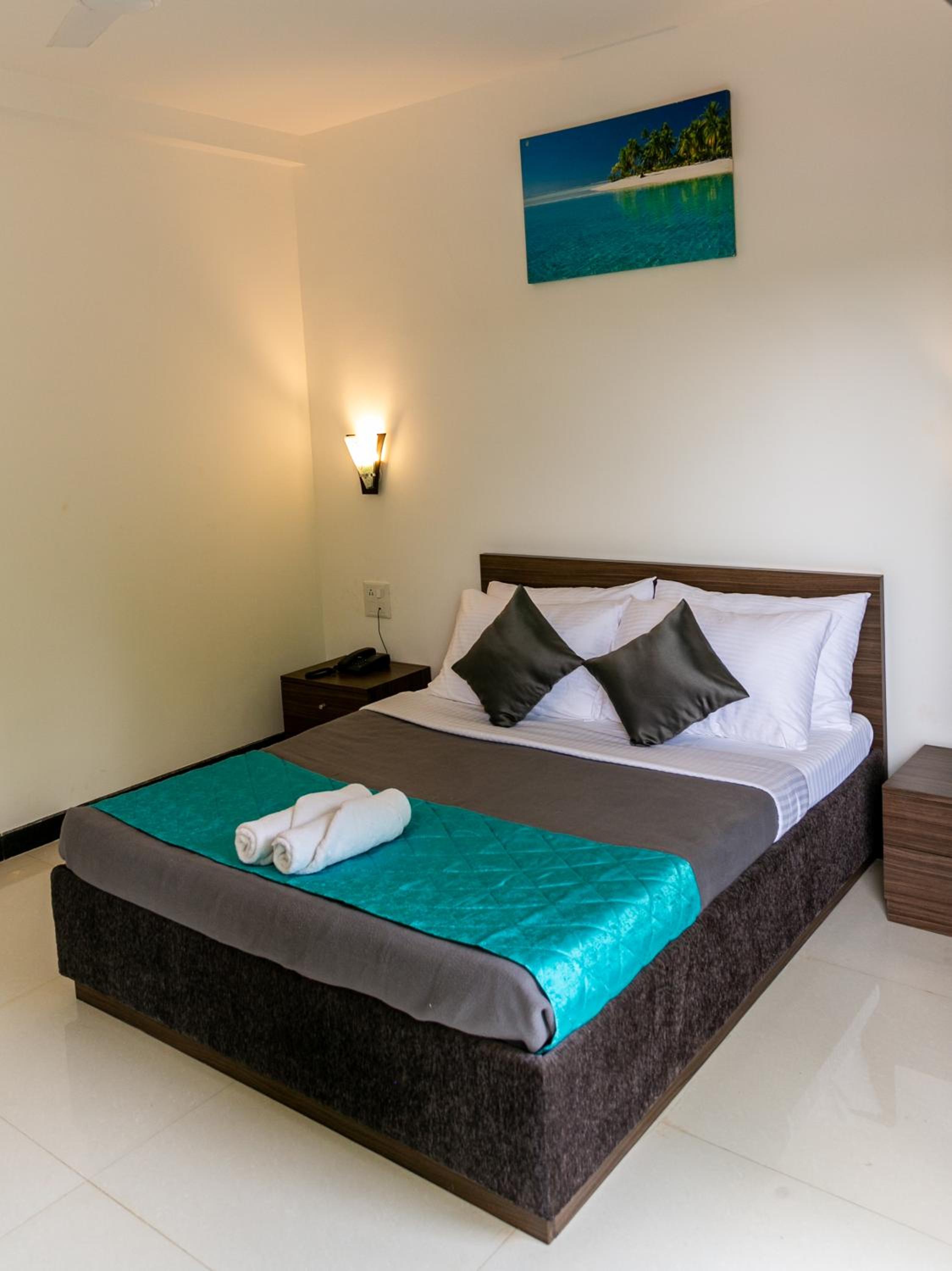 Deluxe Room - Photo 1