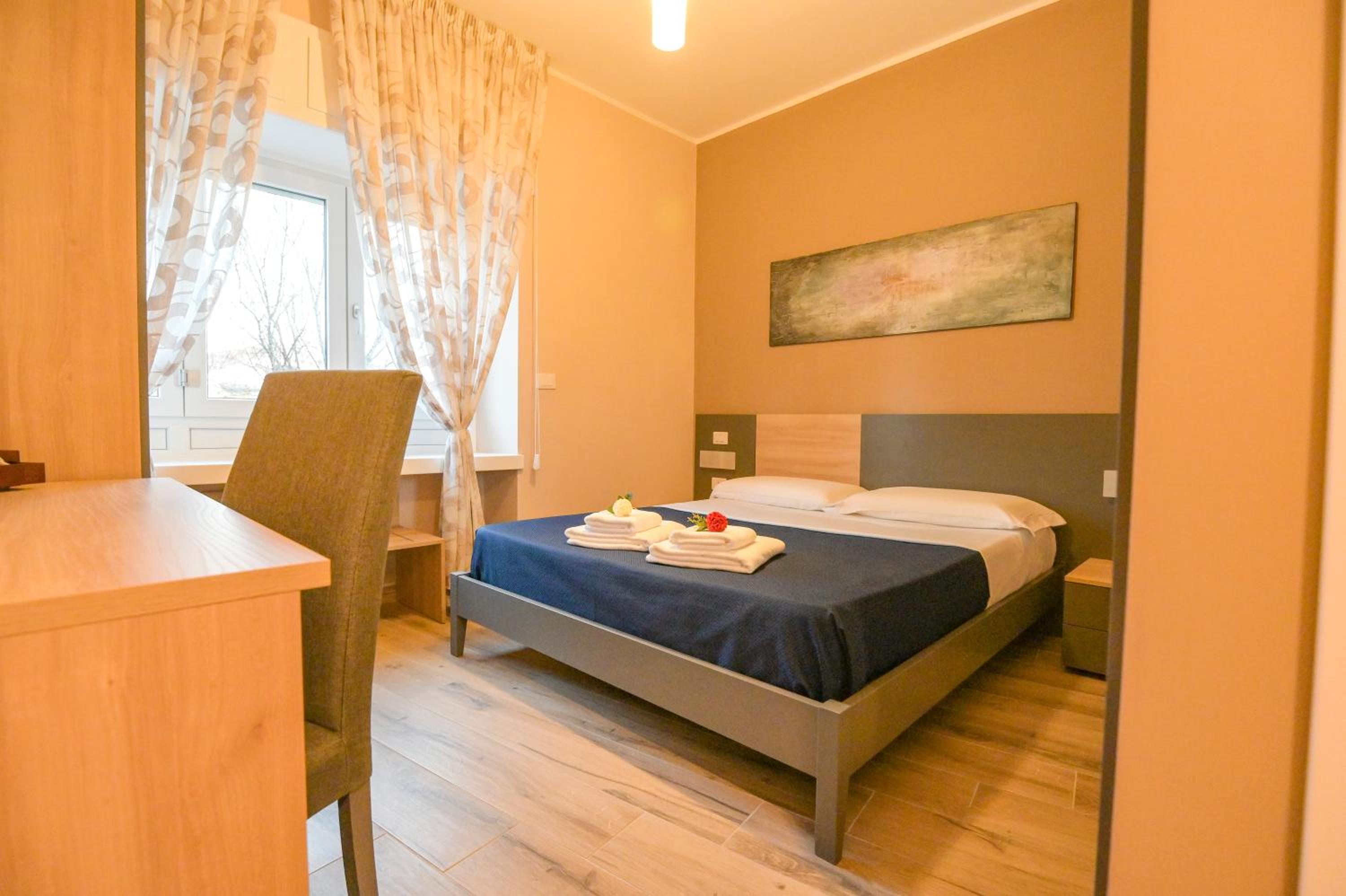 Deluxe Room - Photo 12