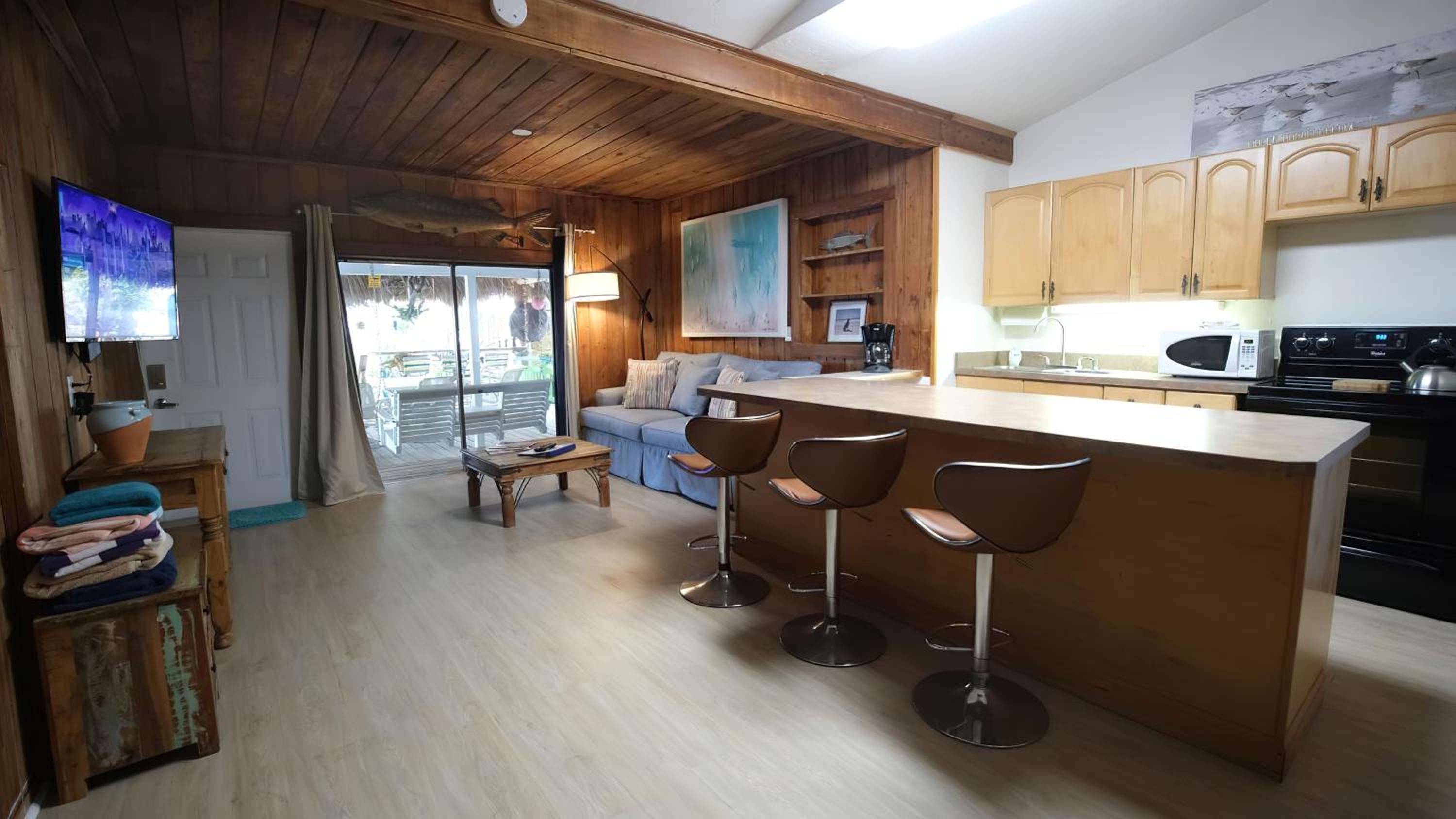 Cottage 3 - One-Bedroom Rustic open to Covered Tiki Deck photo 2