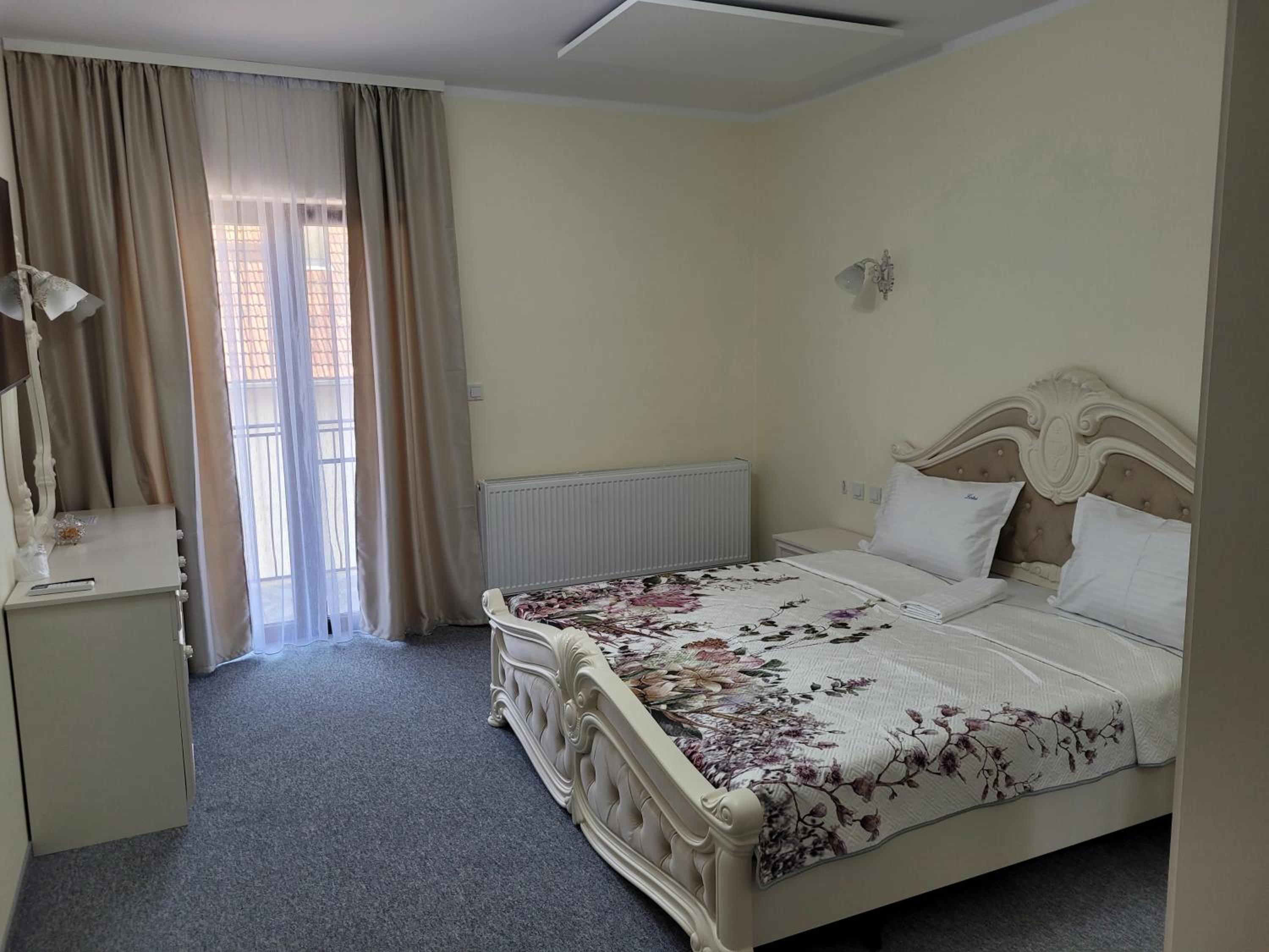 Deluxe Double Room with Balcony - Photo 1