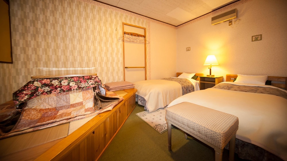 Condominium type with private bath, toilet and kitchenette (Non Smoking)