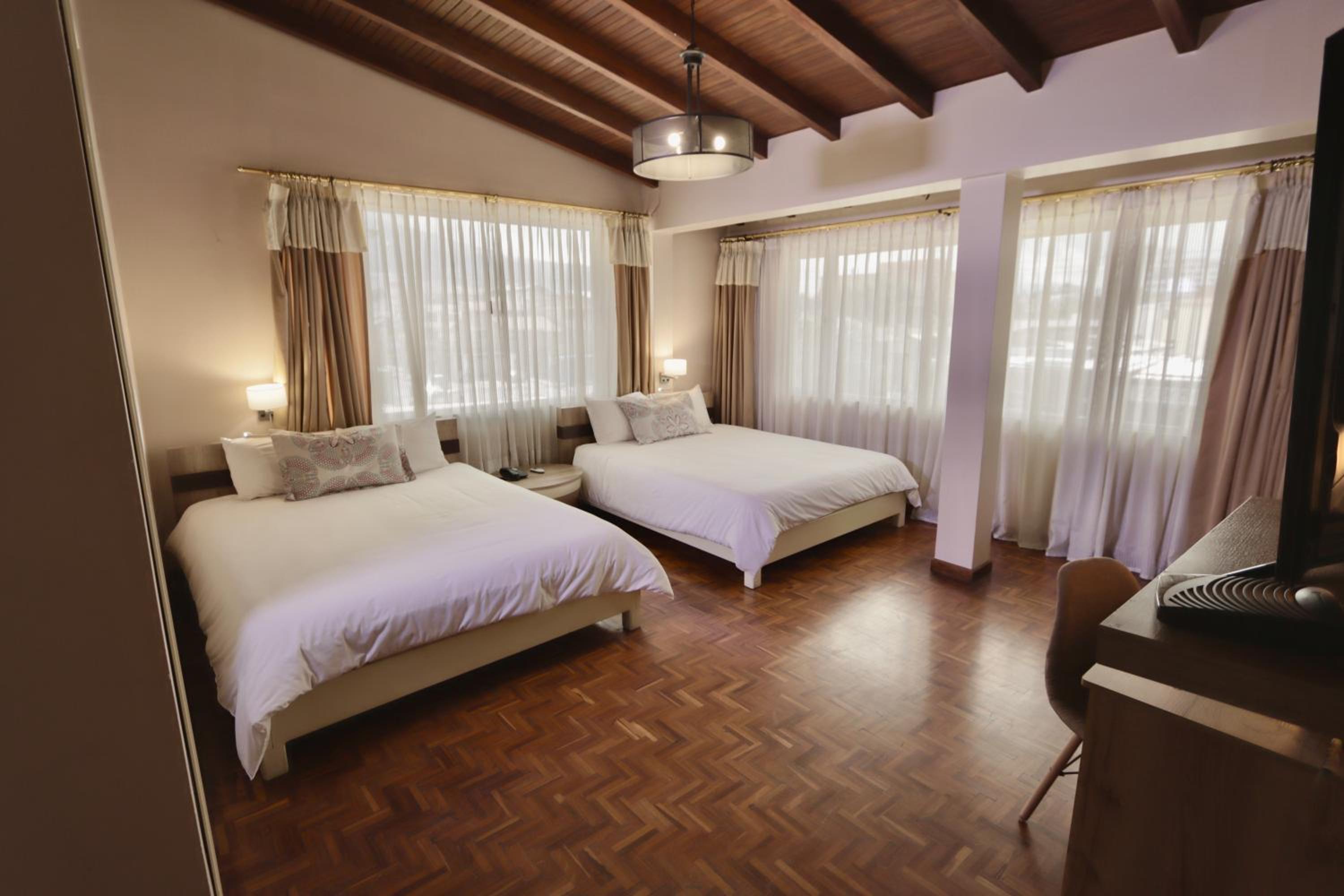 Standard Queen Room with Two Queen Beds photo 1