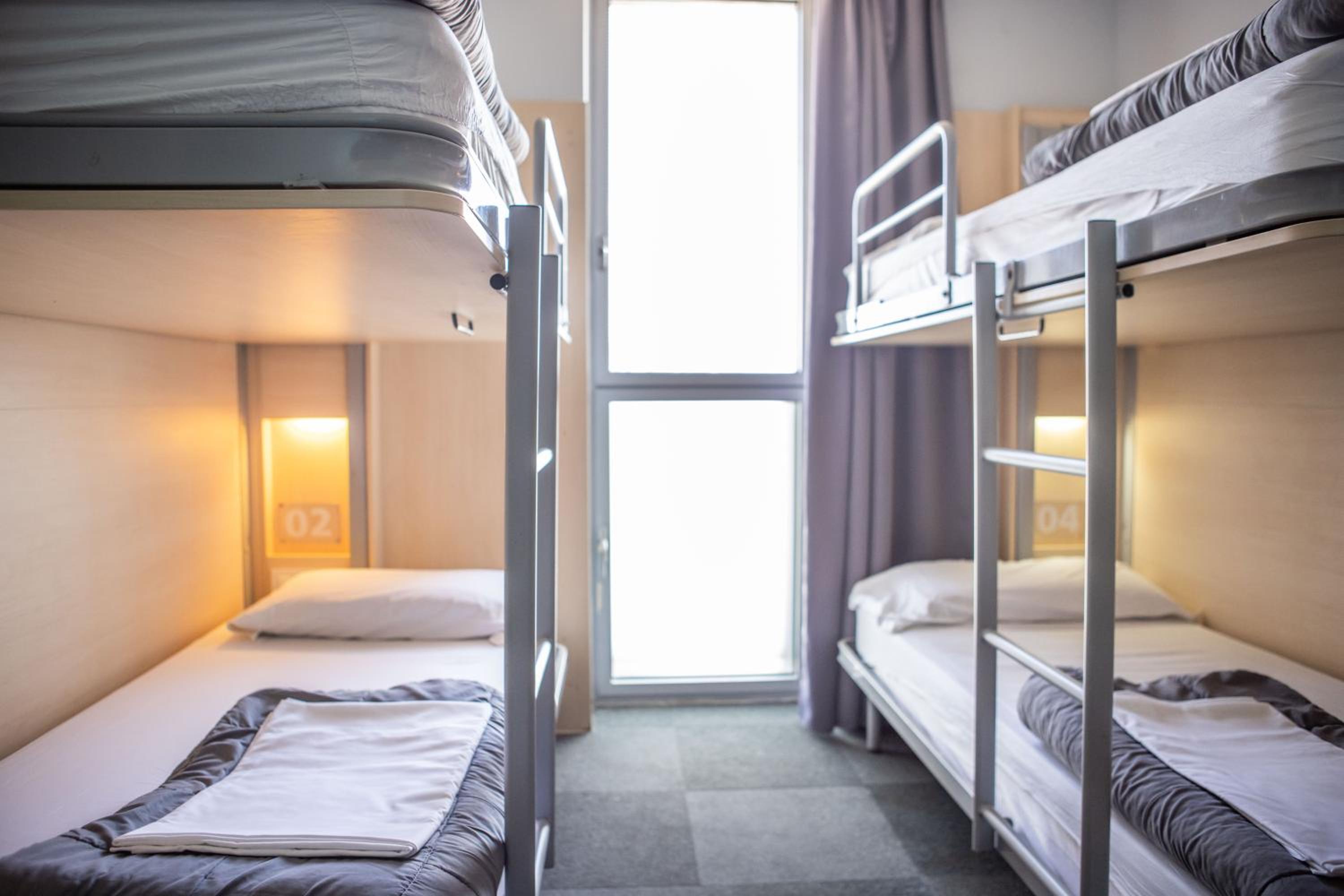 Cama en habitación compartida para 8 personas