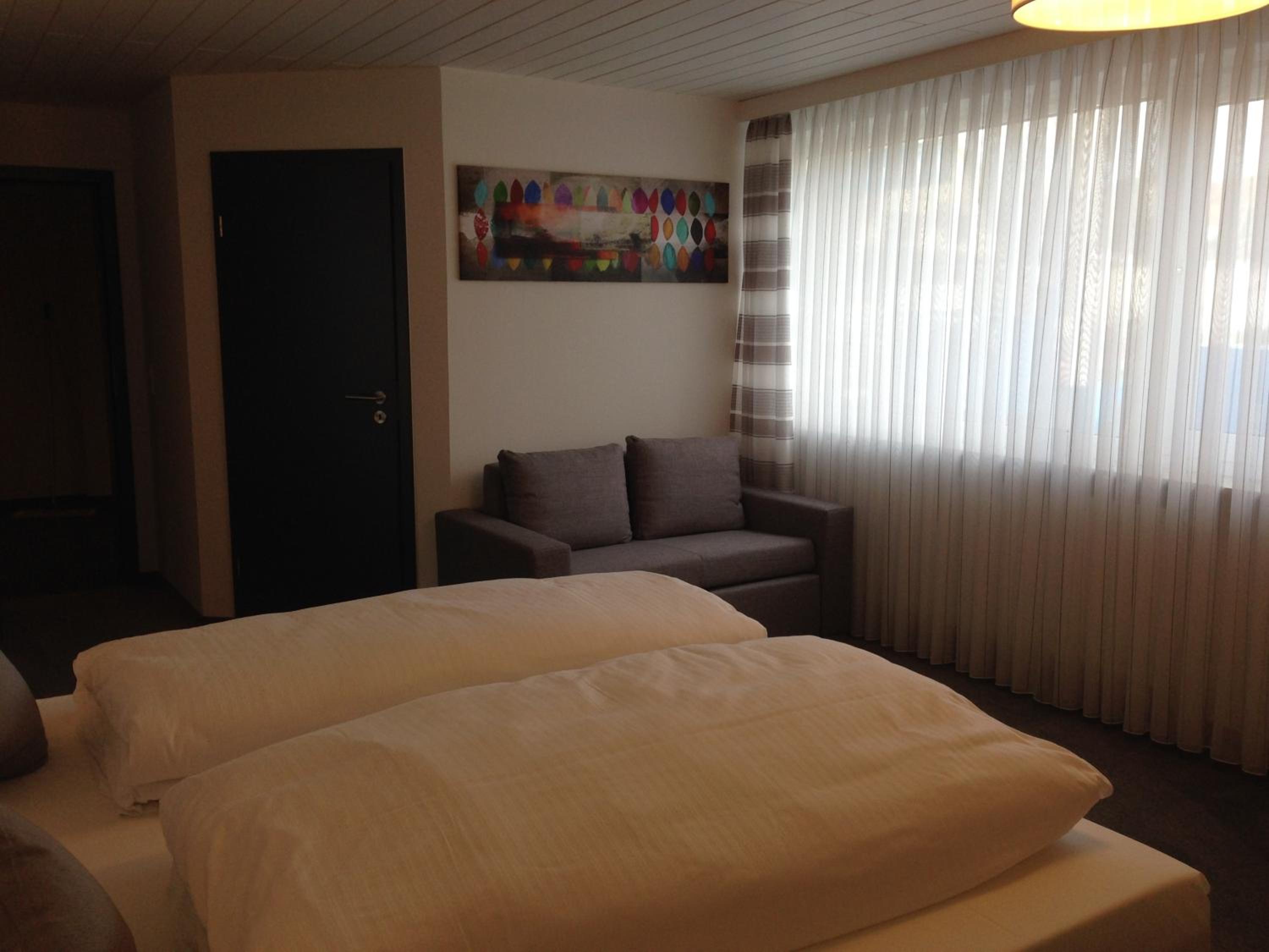 Deluxe Triple Room - Photo 9