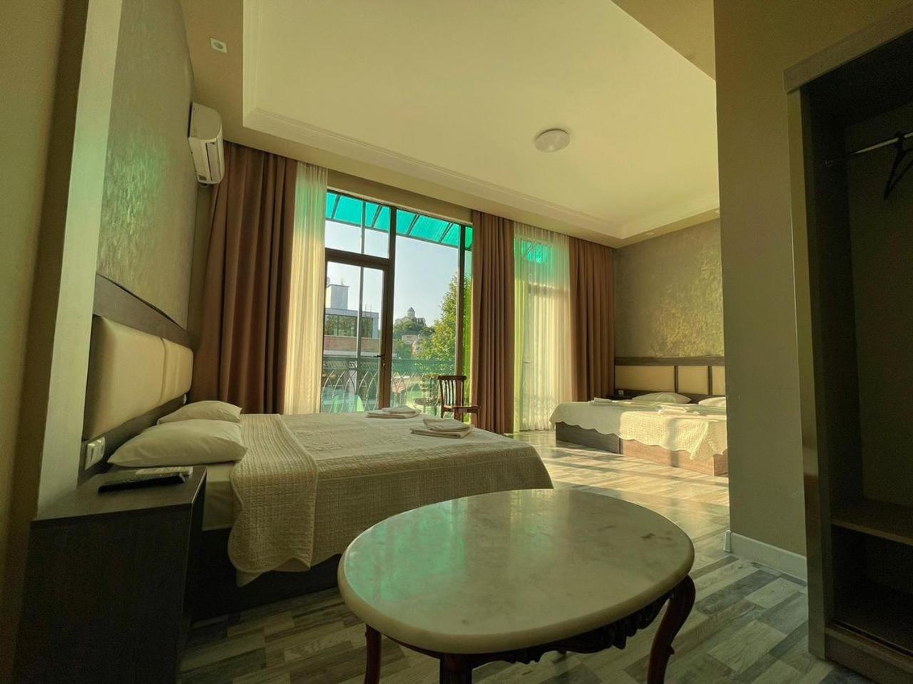 Quadruple Room with Balcony