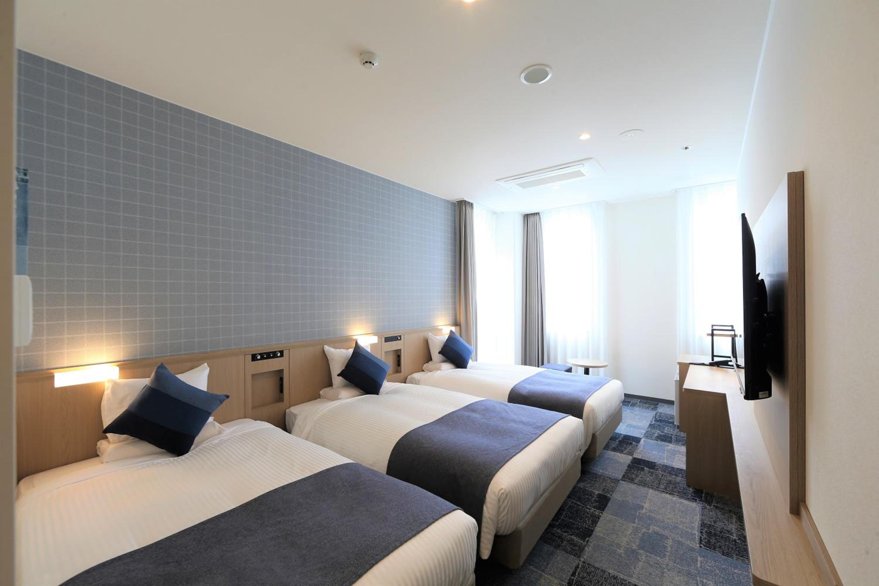 Deluxe Triple Room - Non-Smoking - No Daily Cleaning