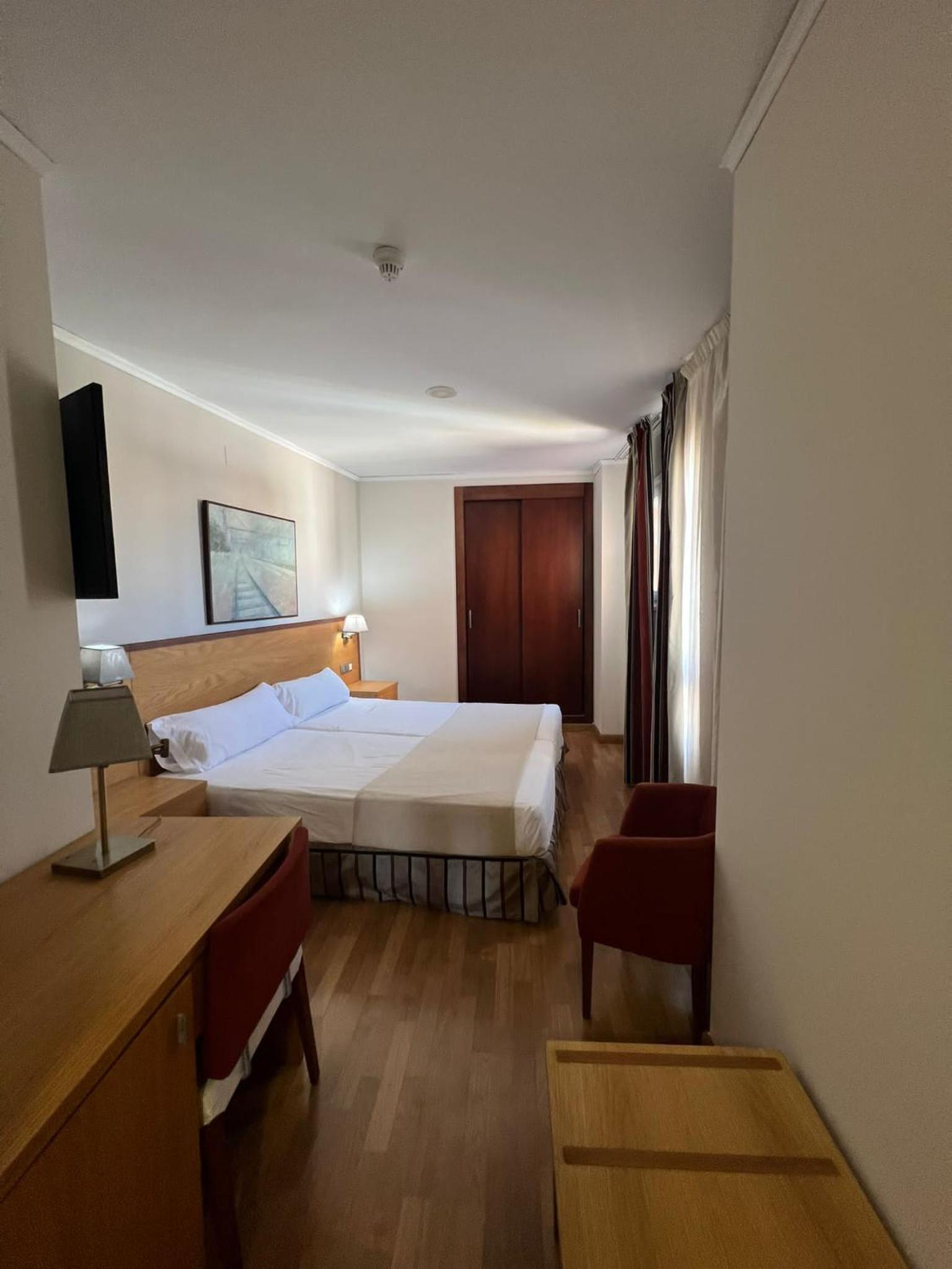 Habitación Doble Estándar o con Dos Camas Individuales.