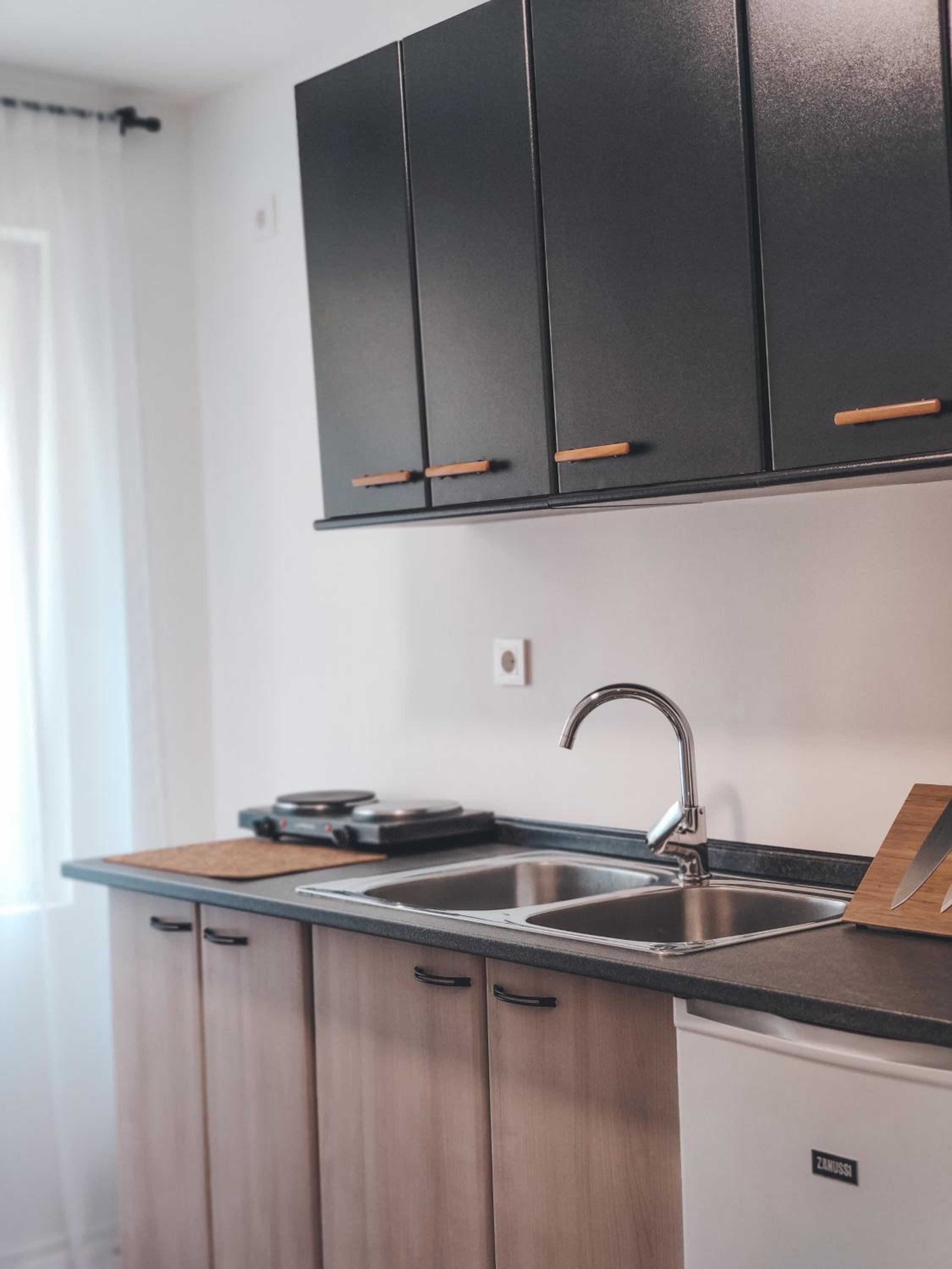 Three-Bedroom Apartment - Photo 33