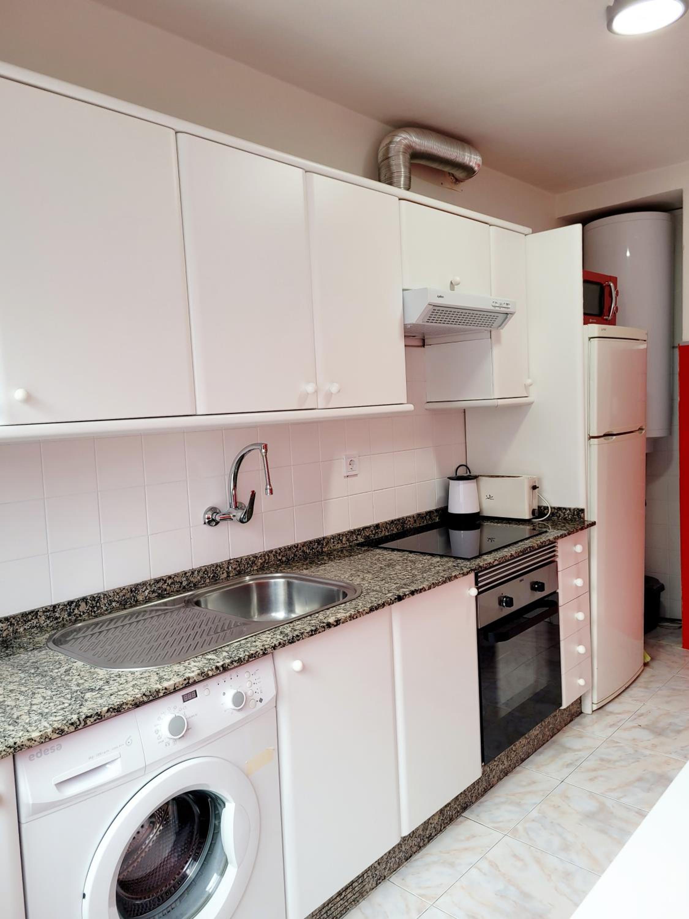 Three-Bedroom Apartment - Photo 11