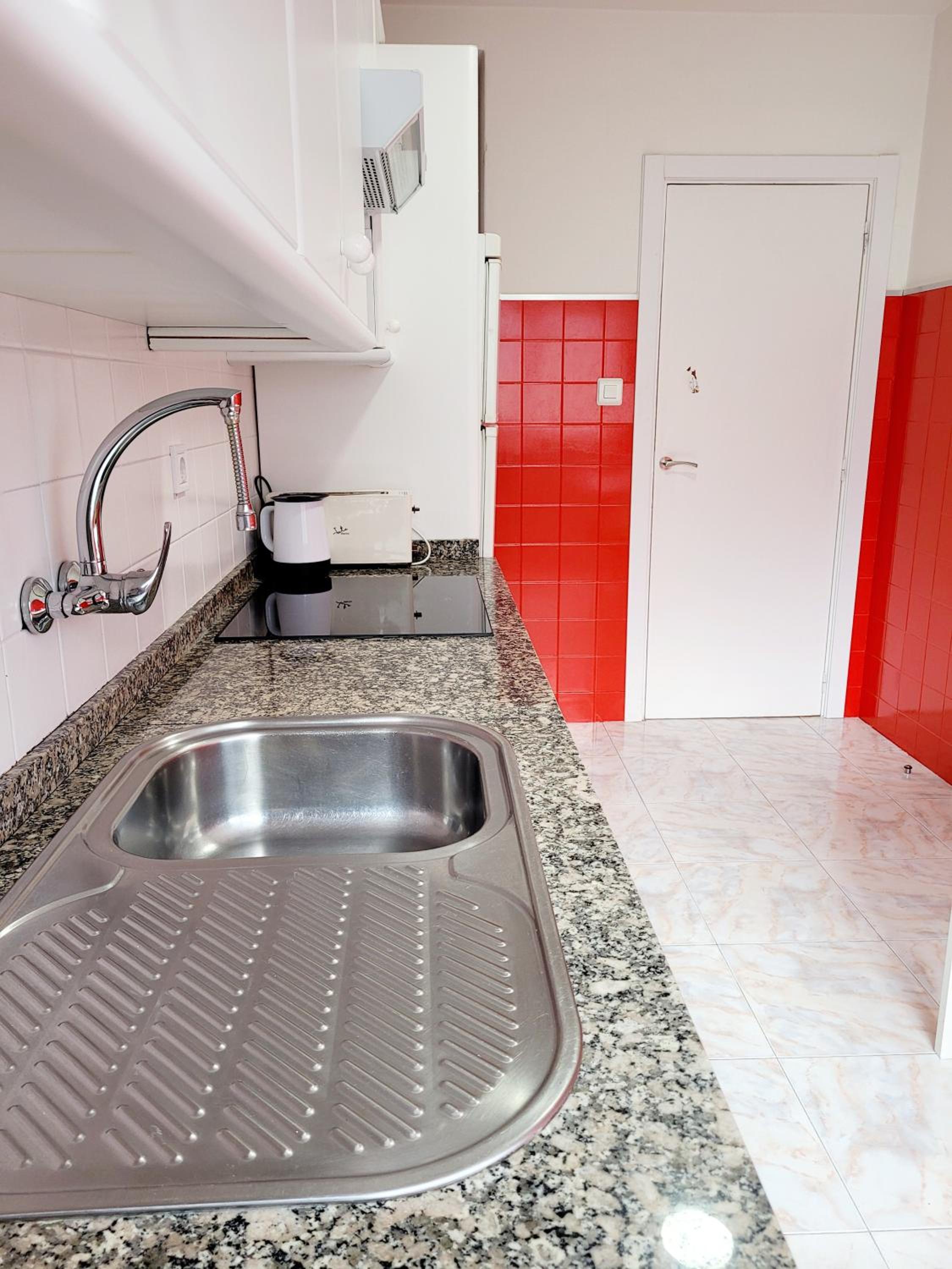 Three-Bedroom Apartment - Photo 10