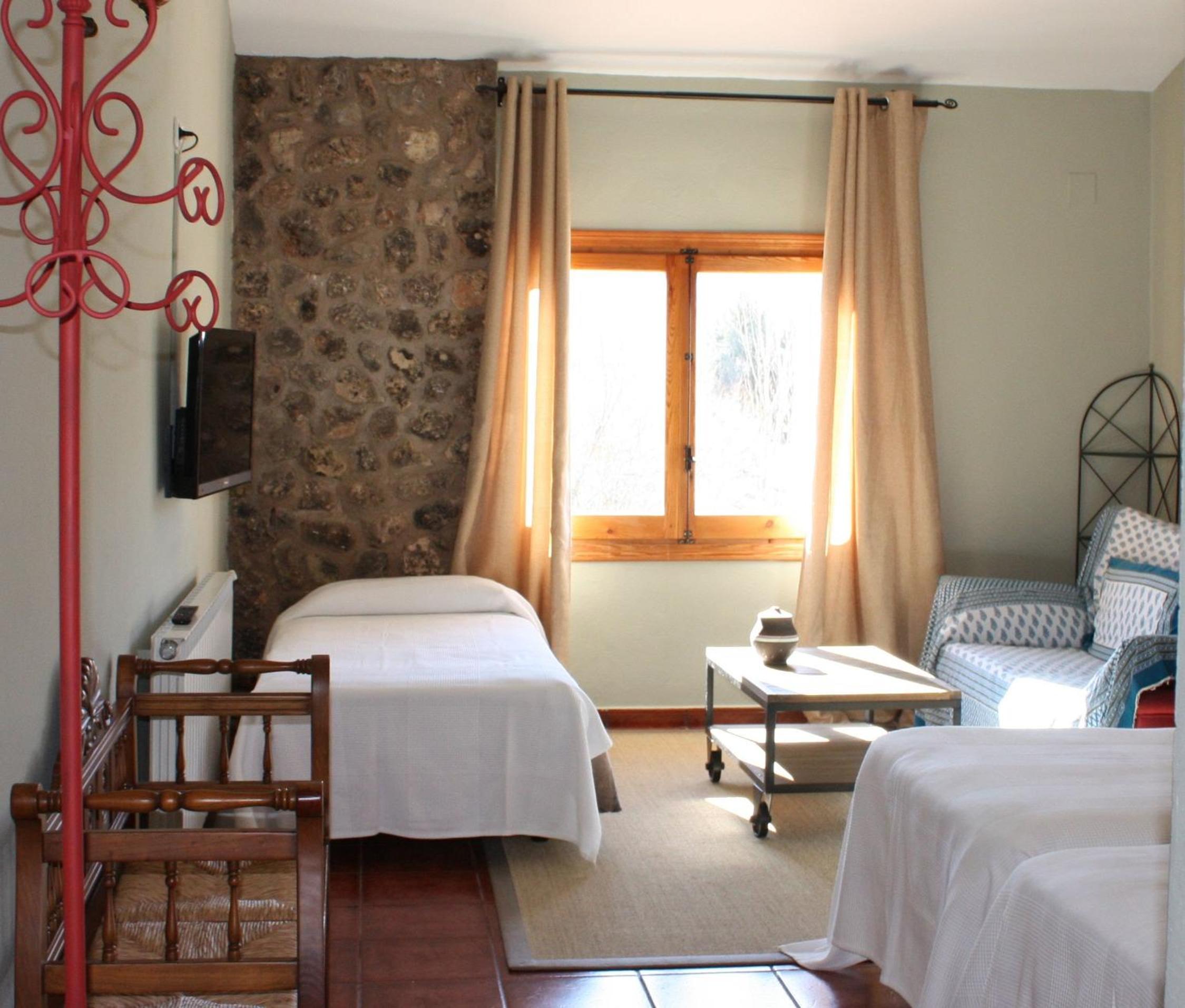 Habitación Triple con Vista a la Montaña
