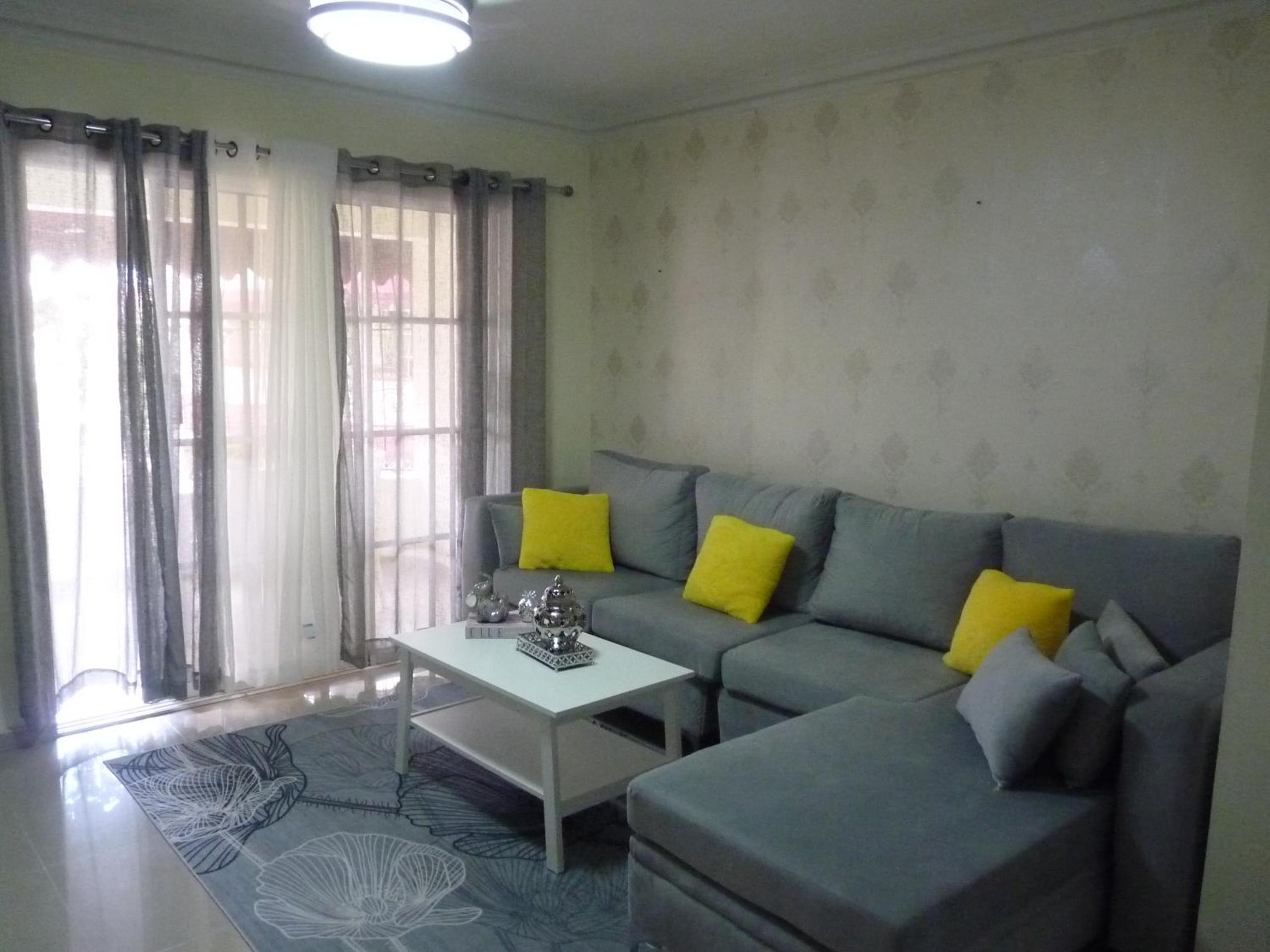 Three-Bedroom Apartment photo 1