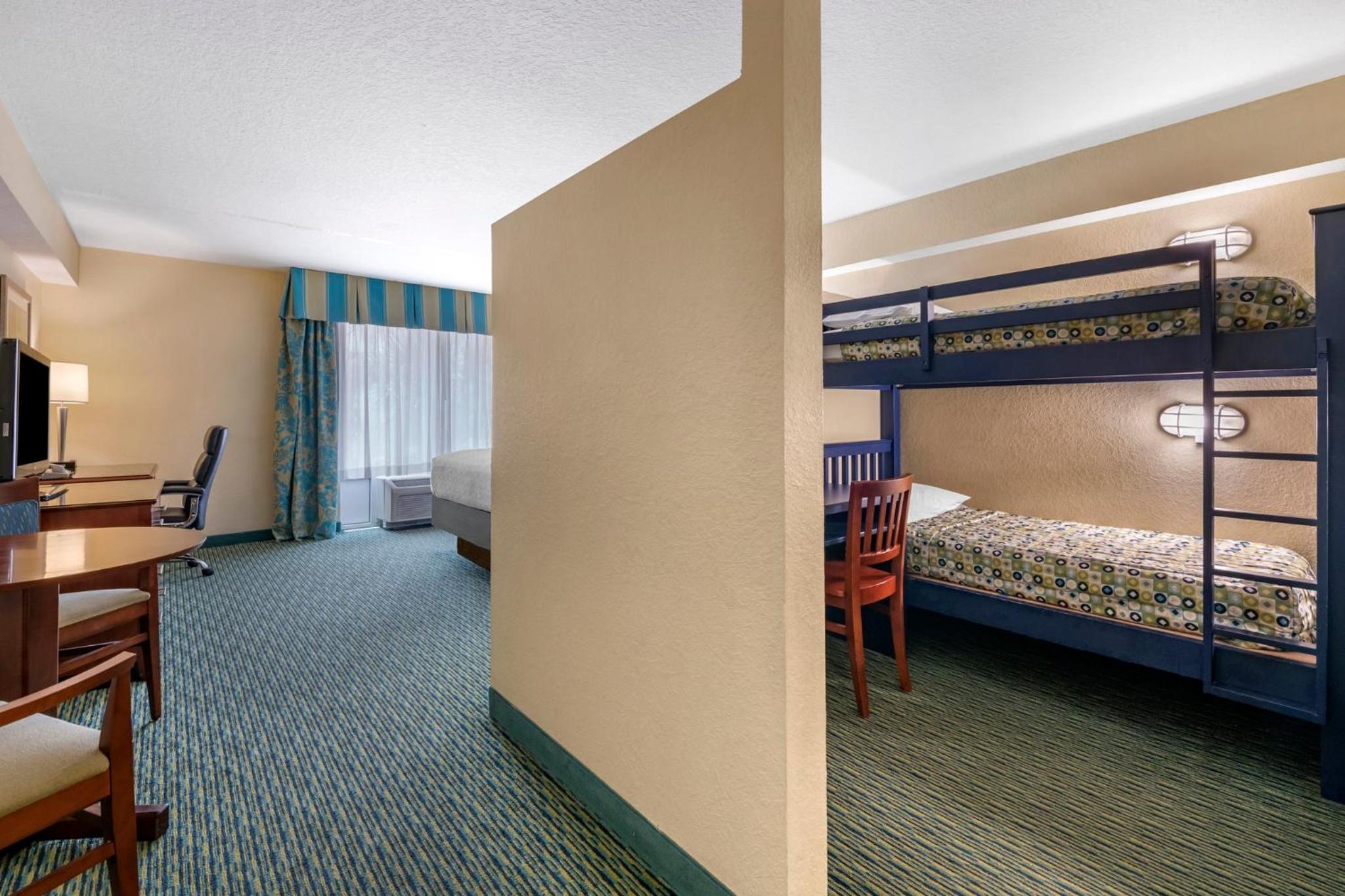 King Suite with Two Bunk Beds and Pool View