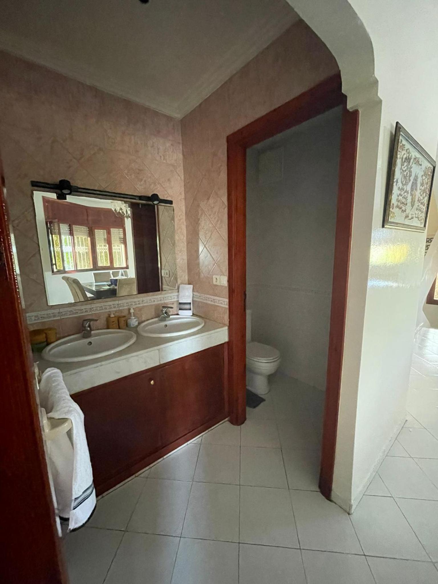 Three-Bedroom House - Photo 15