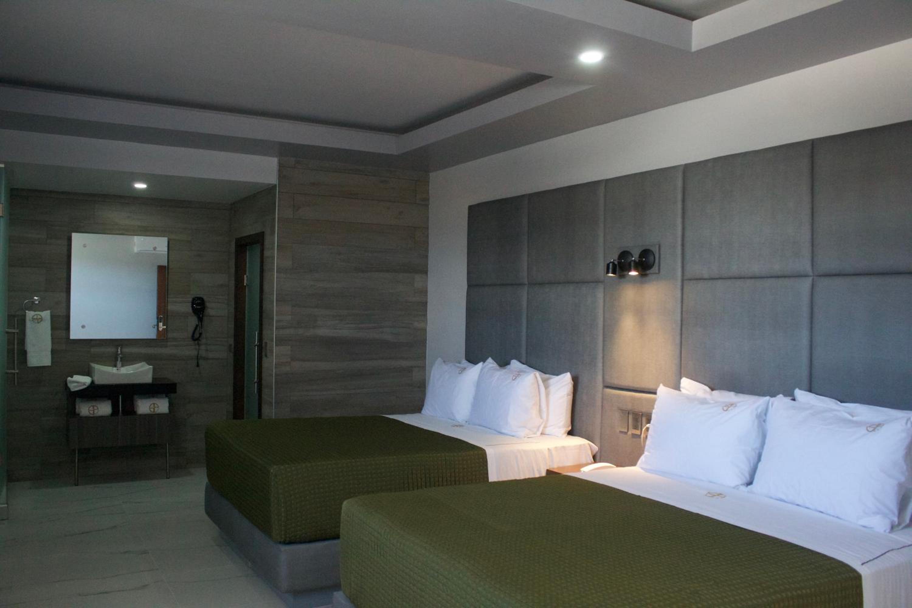 Deluxe Queen Room with Two Queen Beds - Photo 1