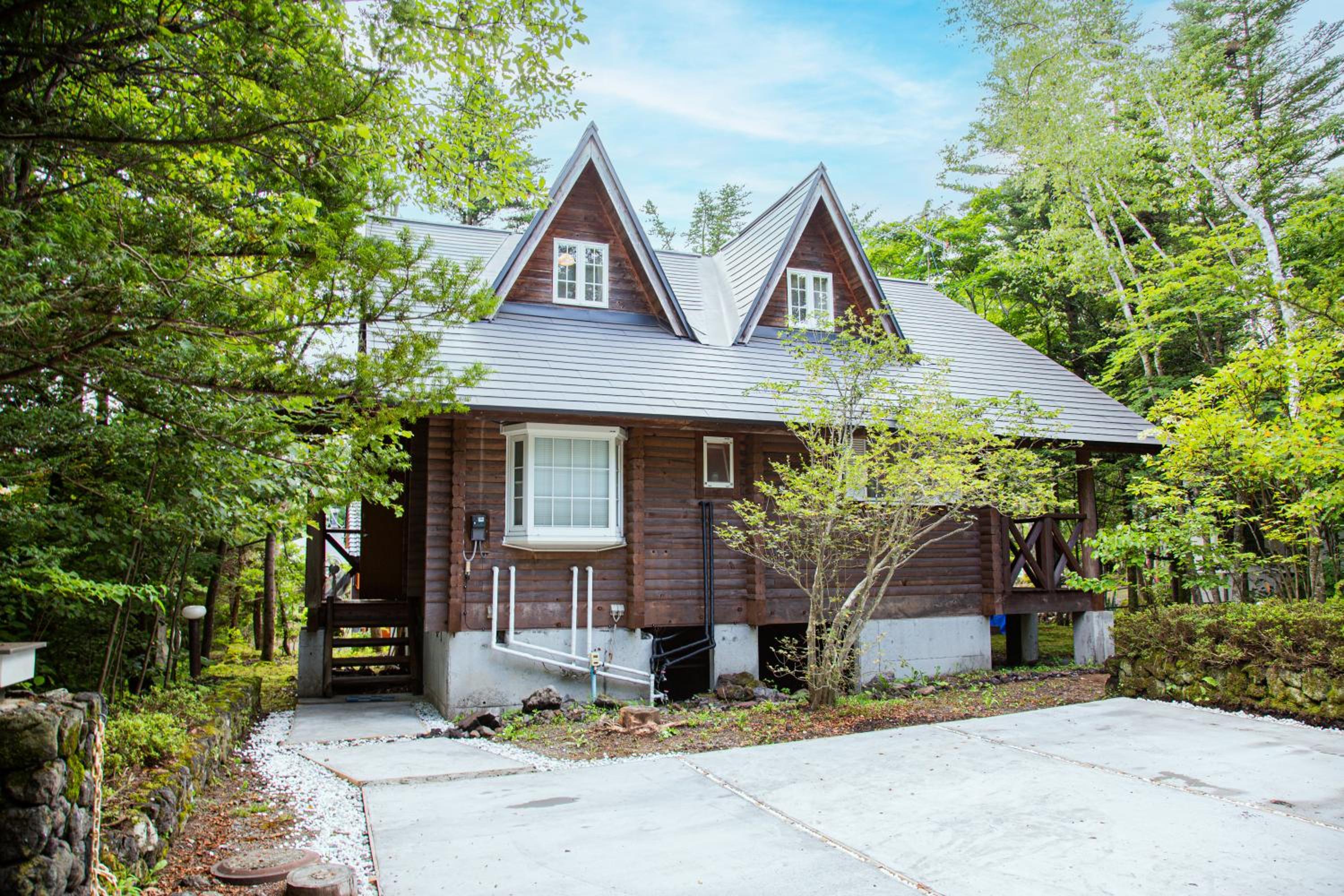 Three-Bedroom House - Photo 32