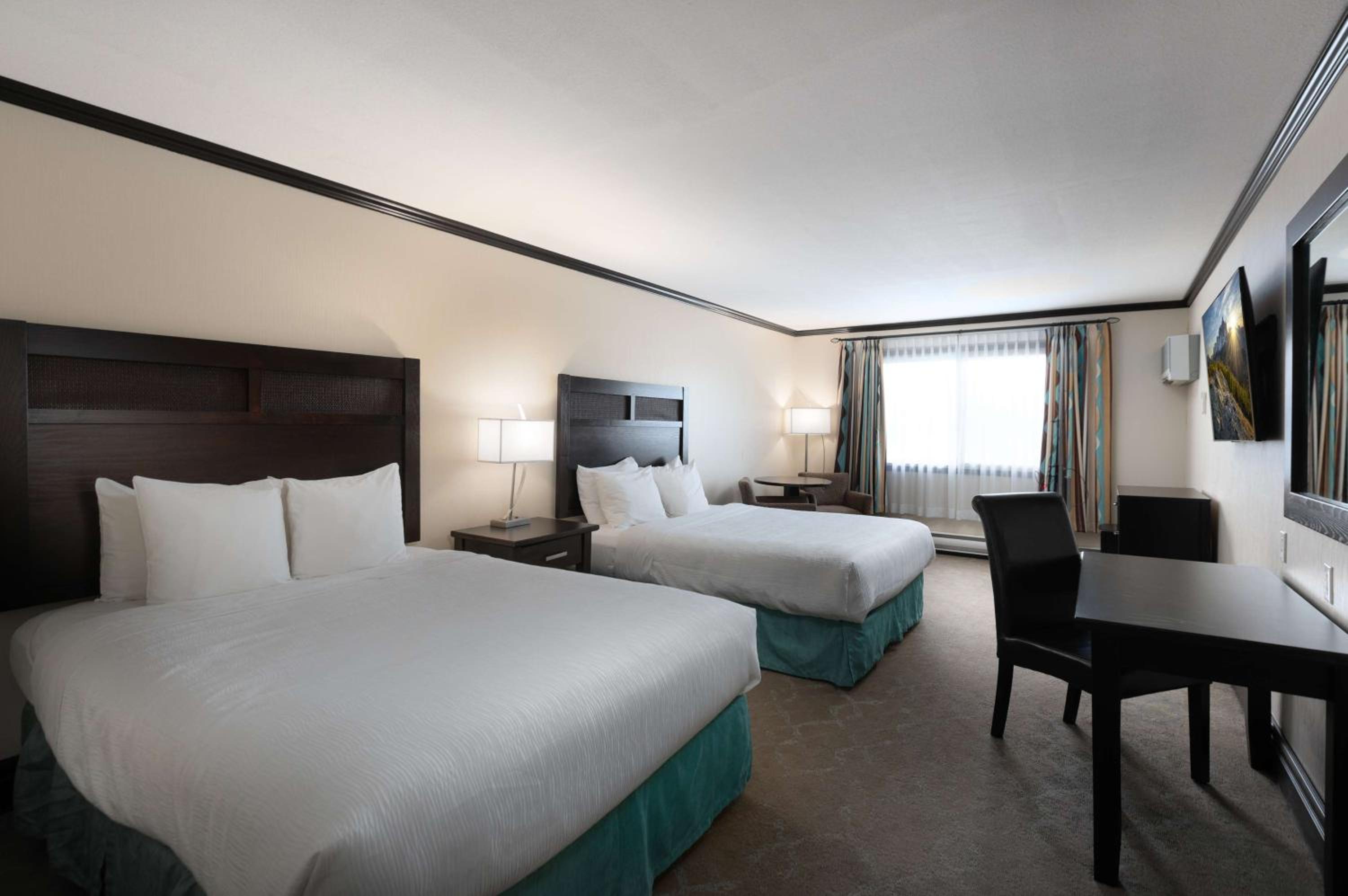 Queen Room with Two Queen Beds - Photo 1