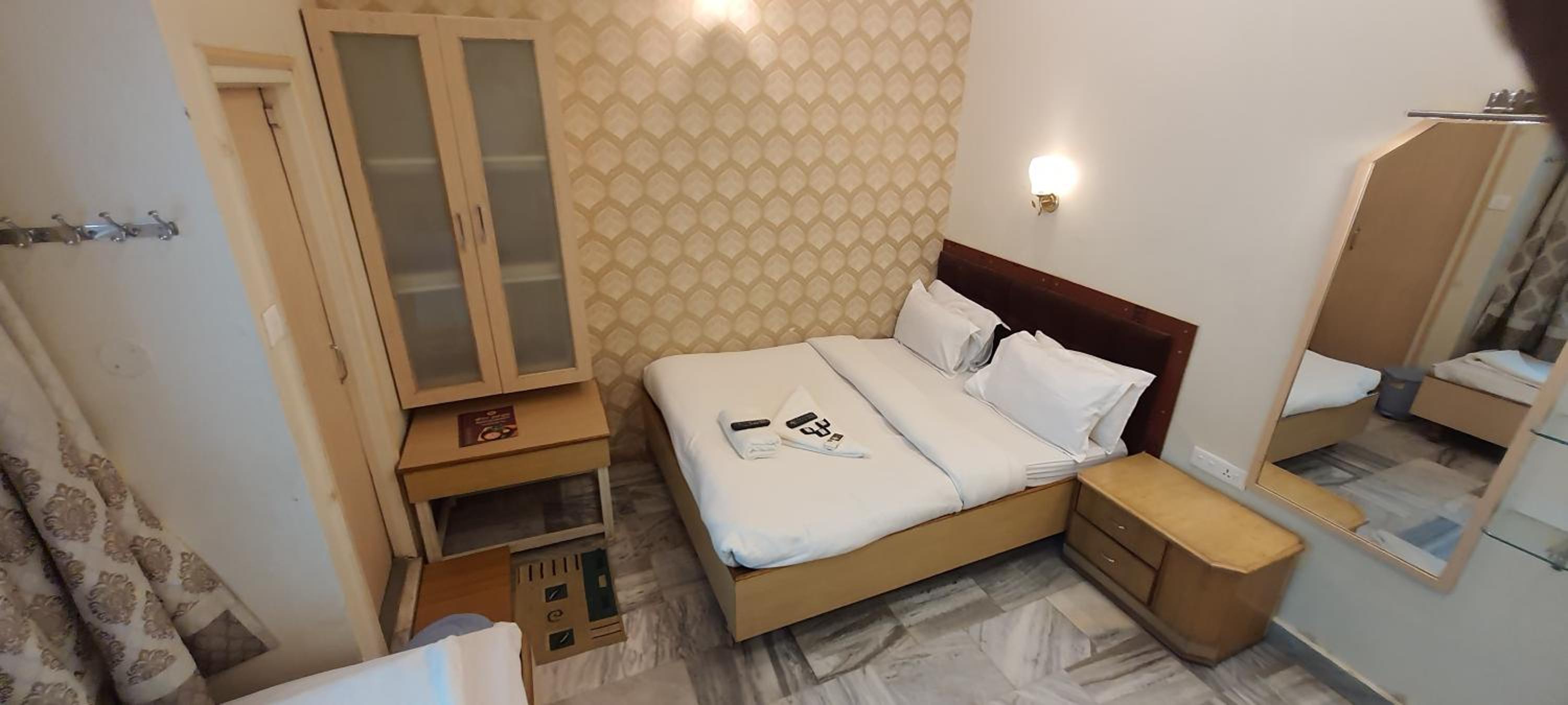 Economy Triple Bed Non View - Photo 17