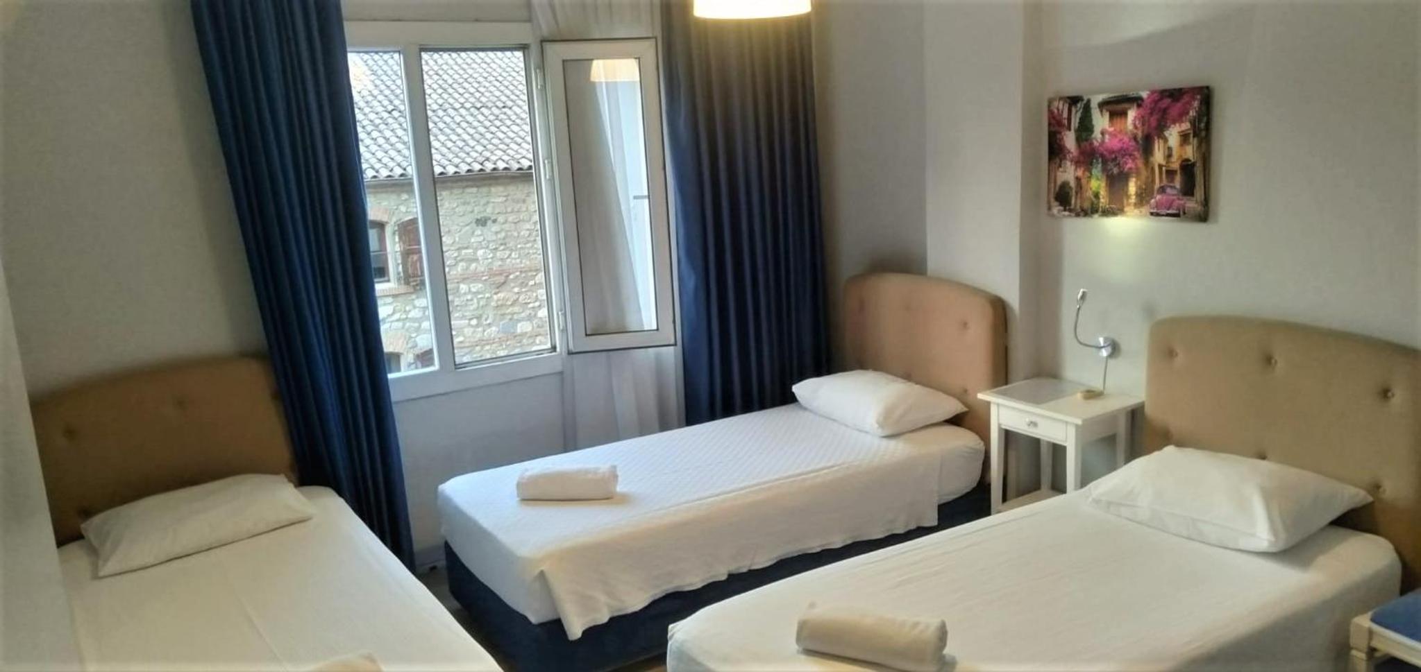 Triple Room - Photo 7