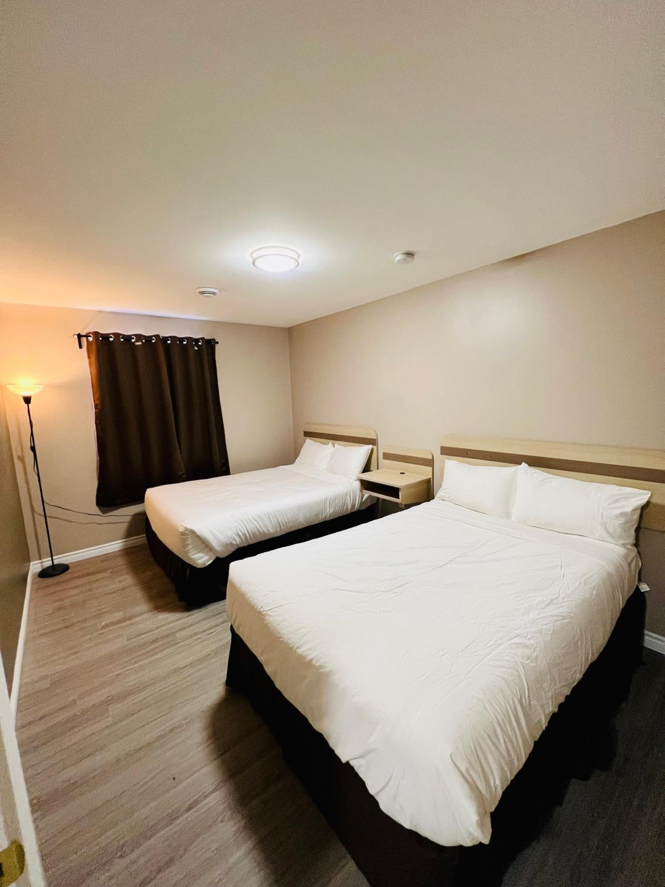 Suite With Three Double Beds - Non-Smoking photo 3