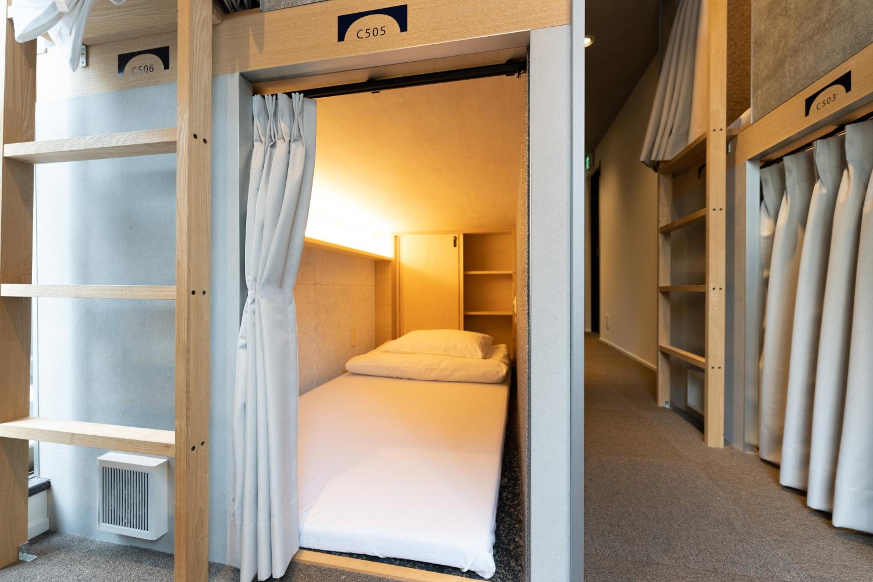 Single Bed In Male Dormitory Room photo 1