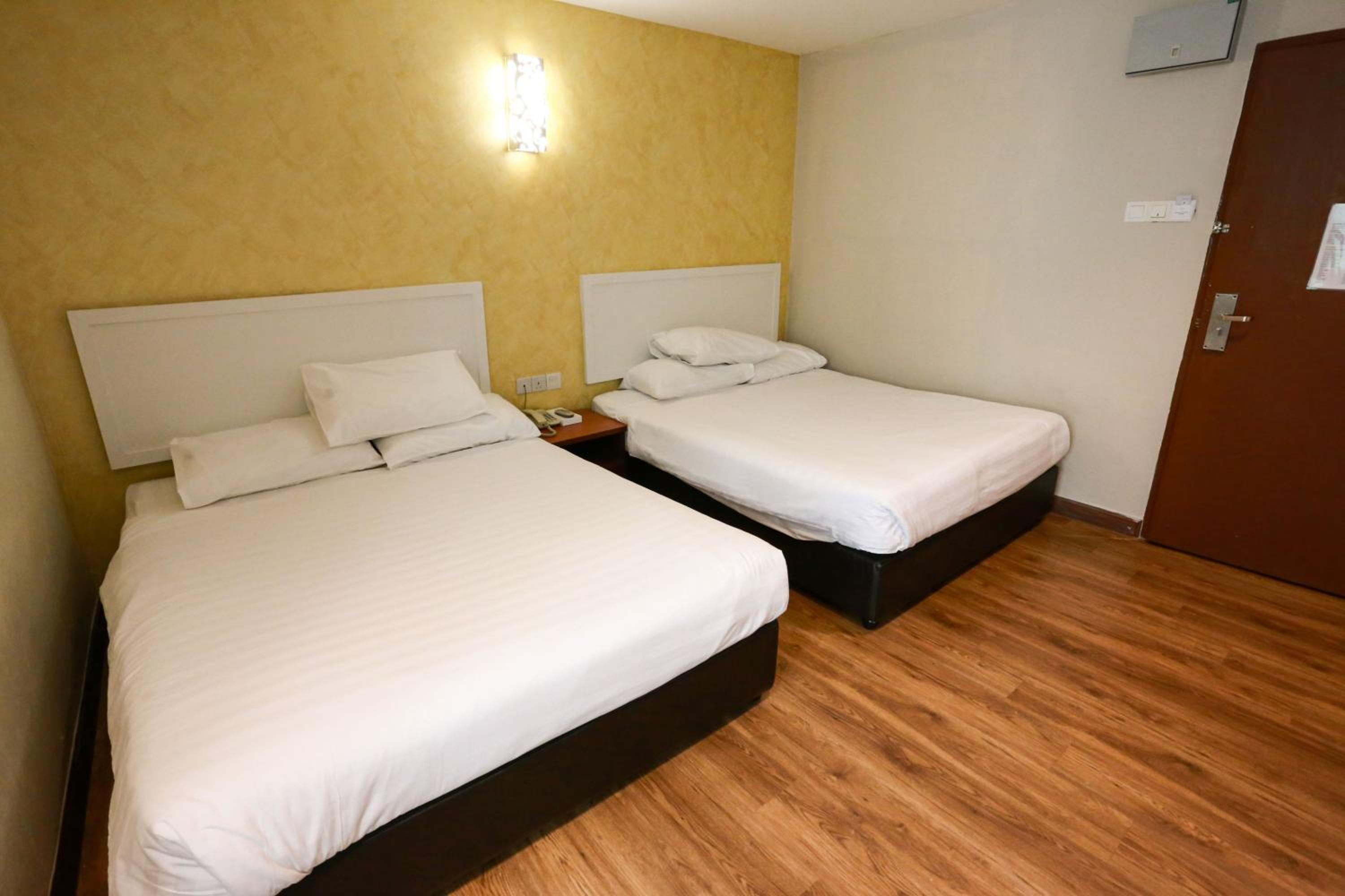 Deluxe Queen Room with Two Queen Beds photo 3