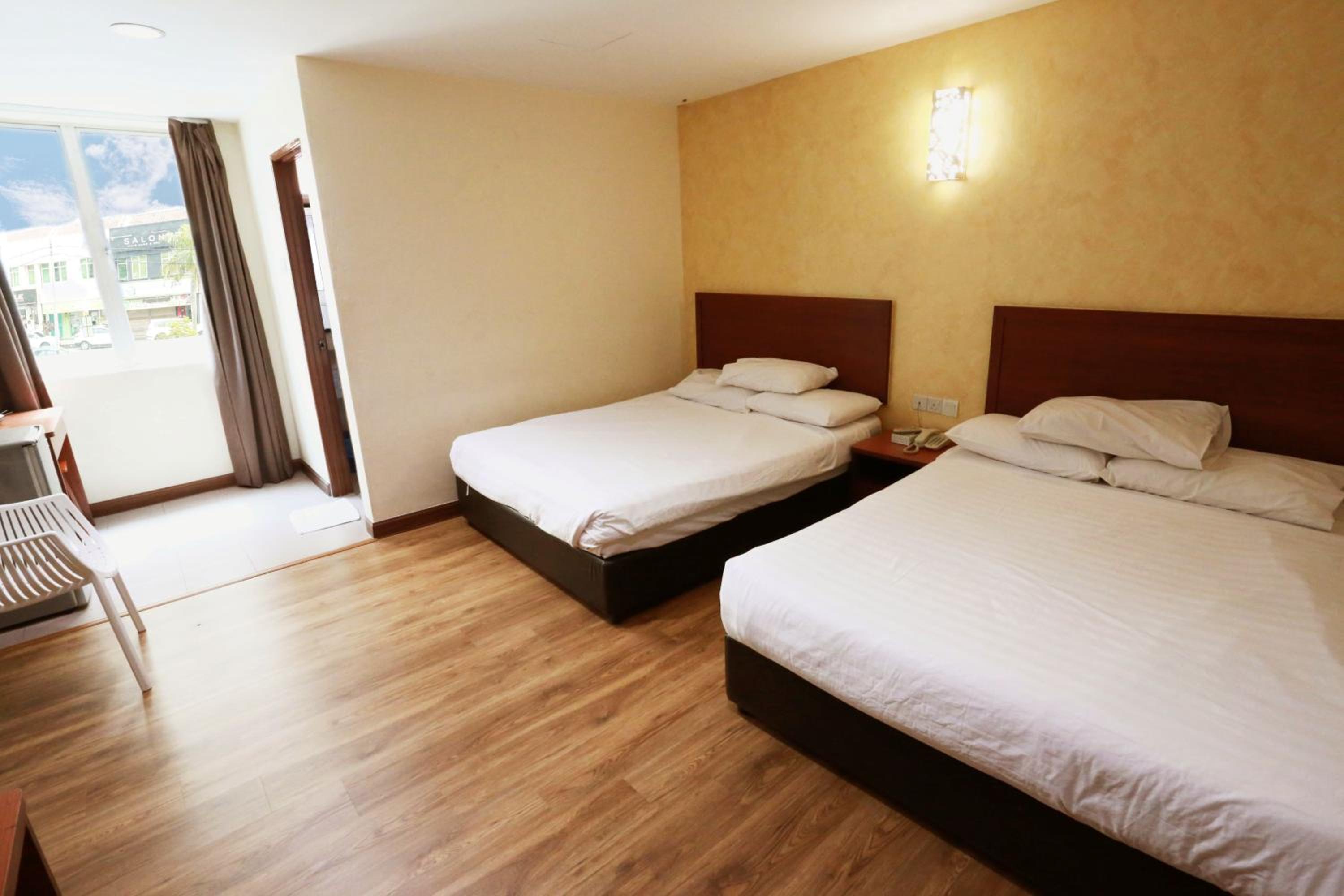 Deluxe Queen Room with Two Queen Beds photo 2