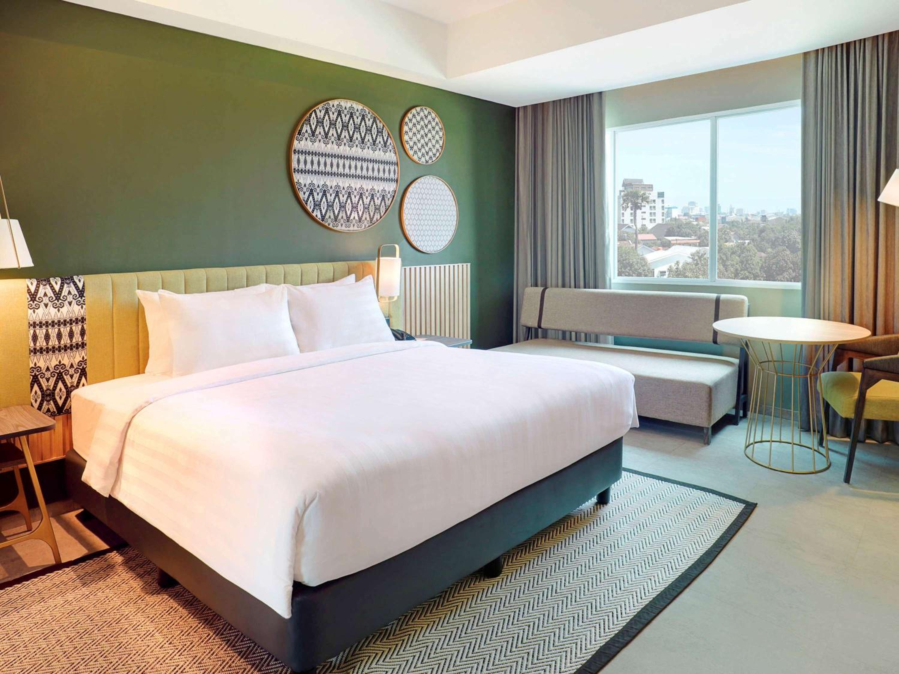 Deluxe King Room with Sofa - Photo 1