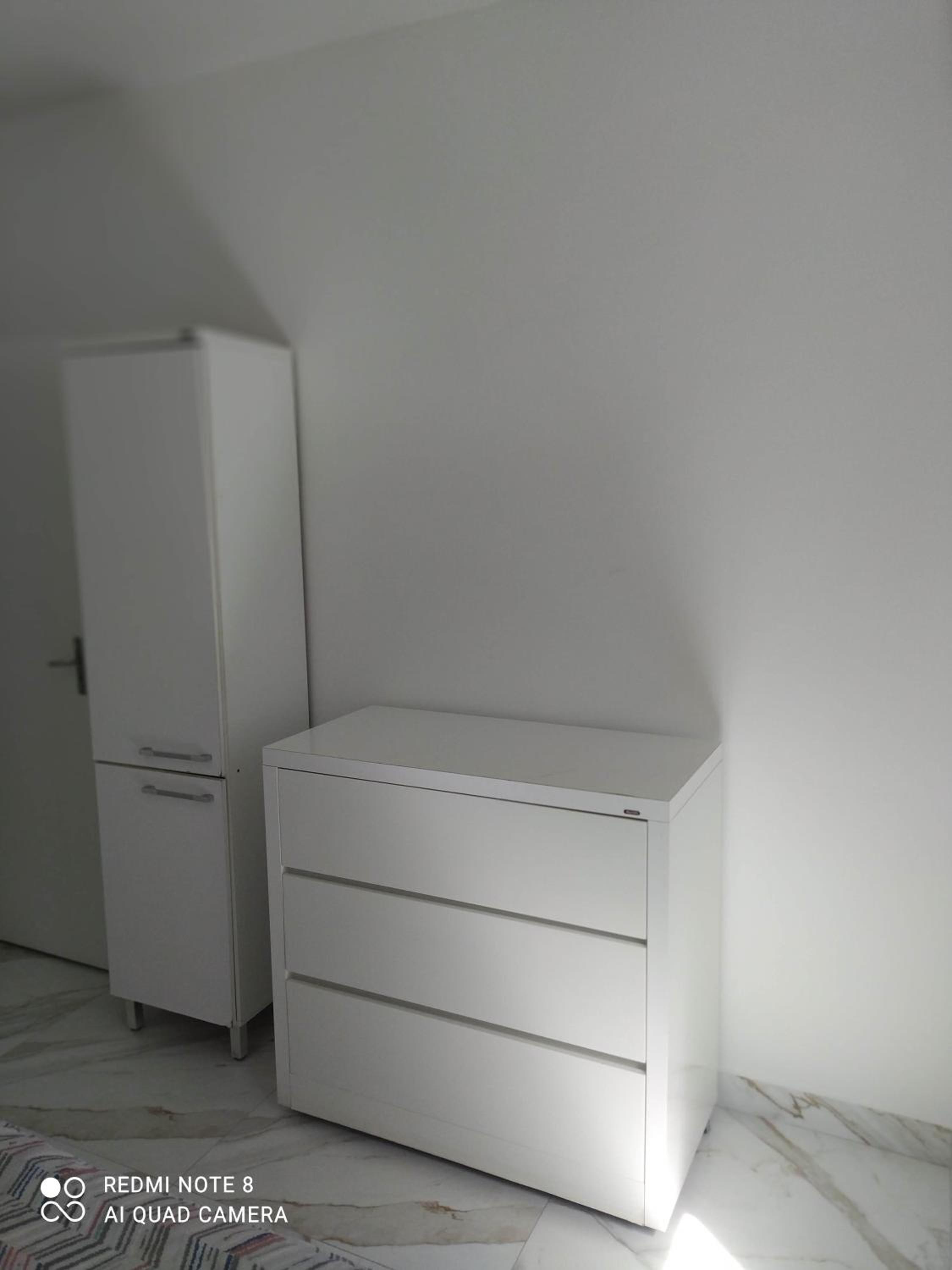 Three-Bedroom Apartment - Photo 32