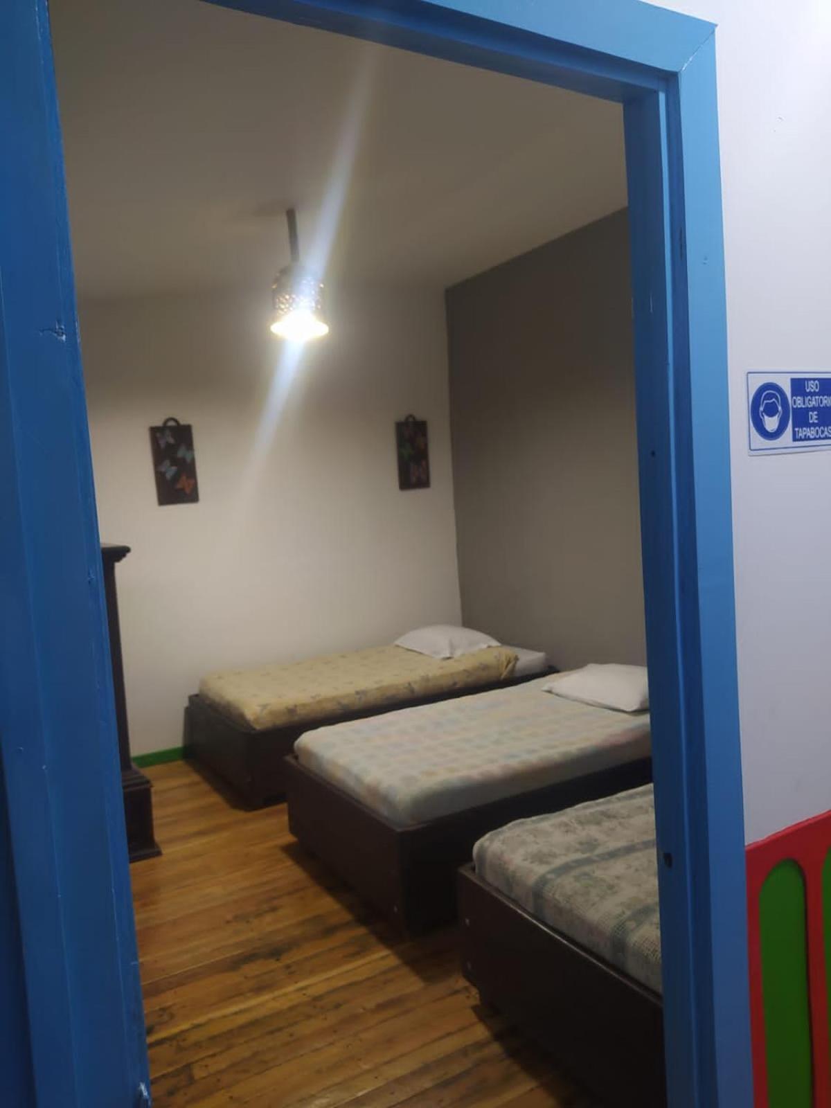Basic Triple Room with Shared Bathroom photo 3