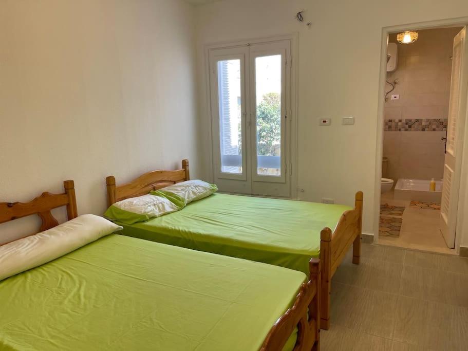 Three-Bedroom House - Photo 27
