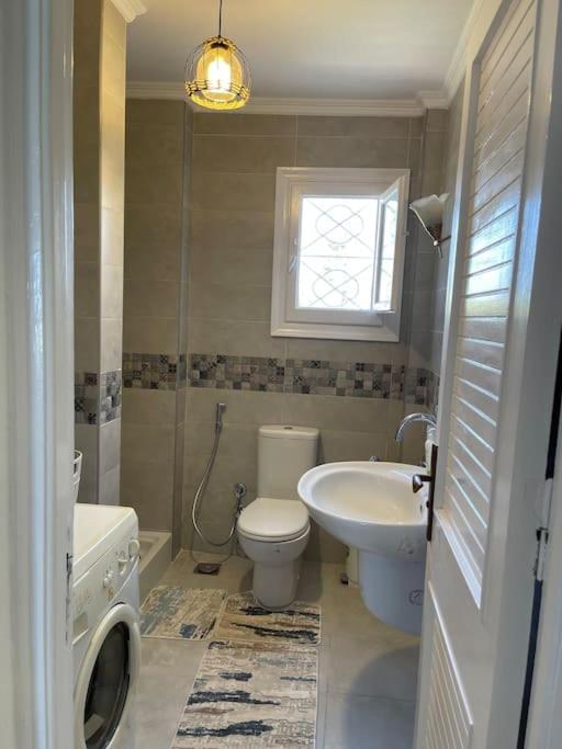 Three-Bedroom House - Photo 25